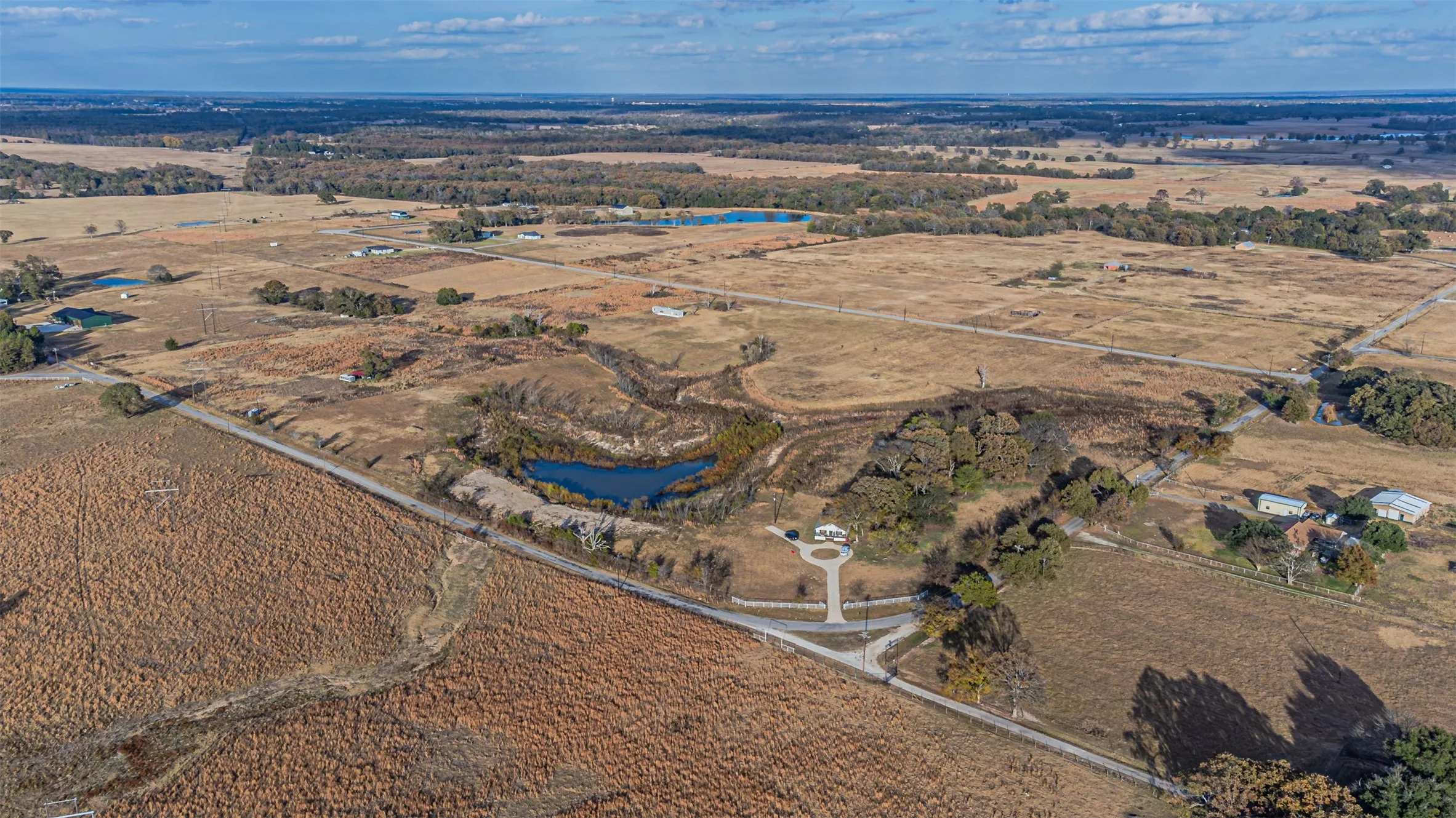 View of property location featuring rural landscape and a large body of water