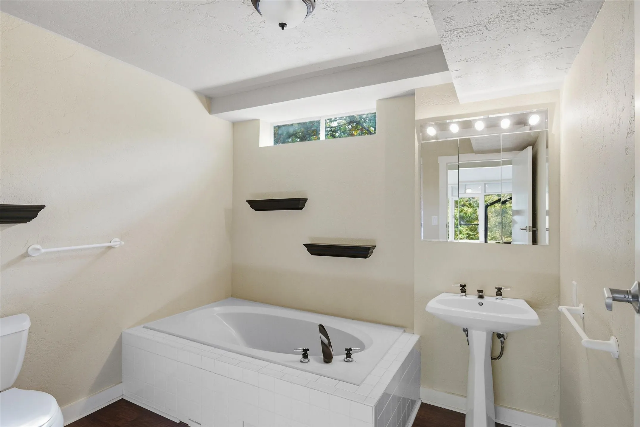 On the Loft level is a bathroom for guests and 3rd Bedroom