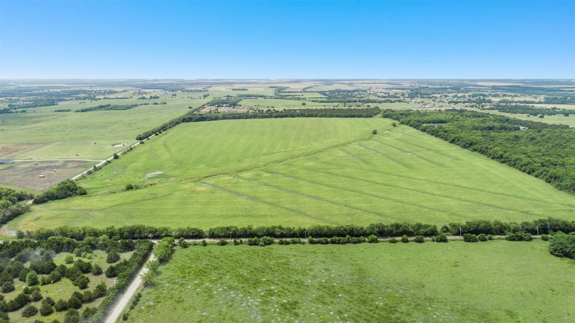 View of rural area with large plots for crops