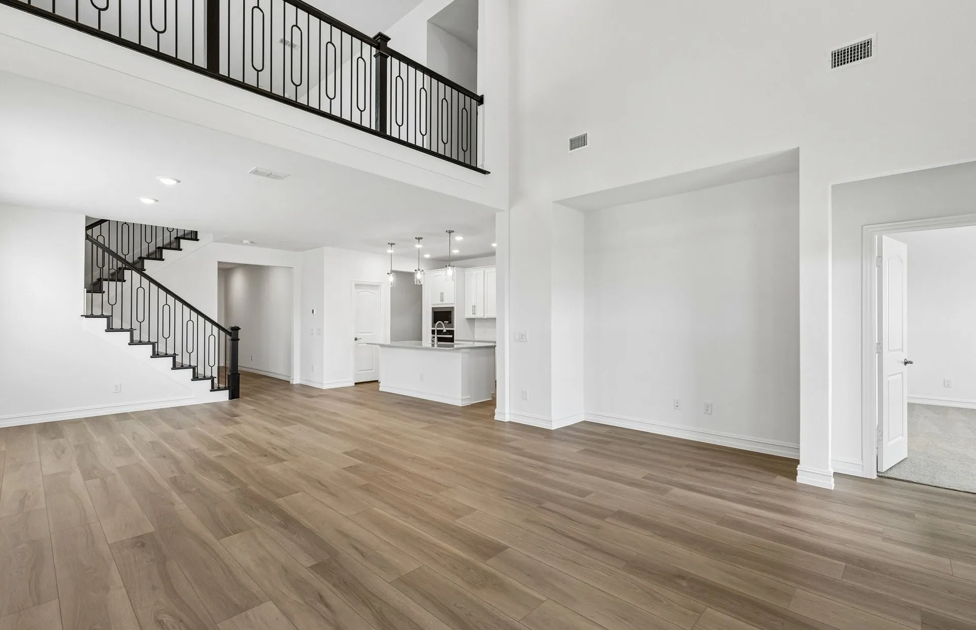 Spacious gathering room with beautiful flooring