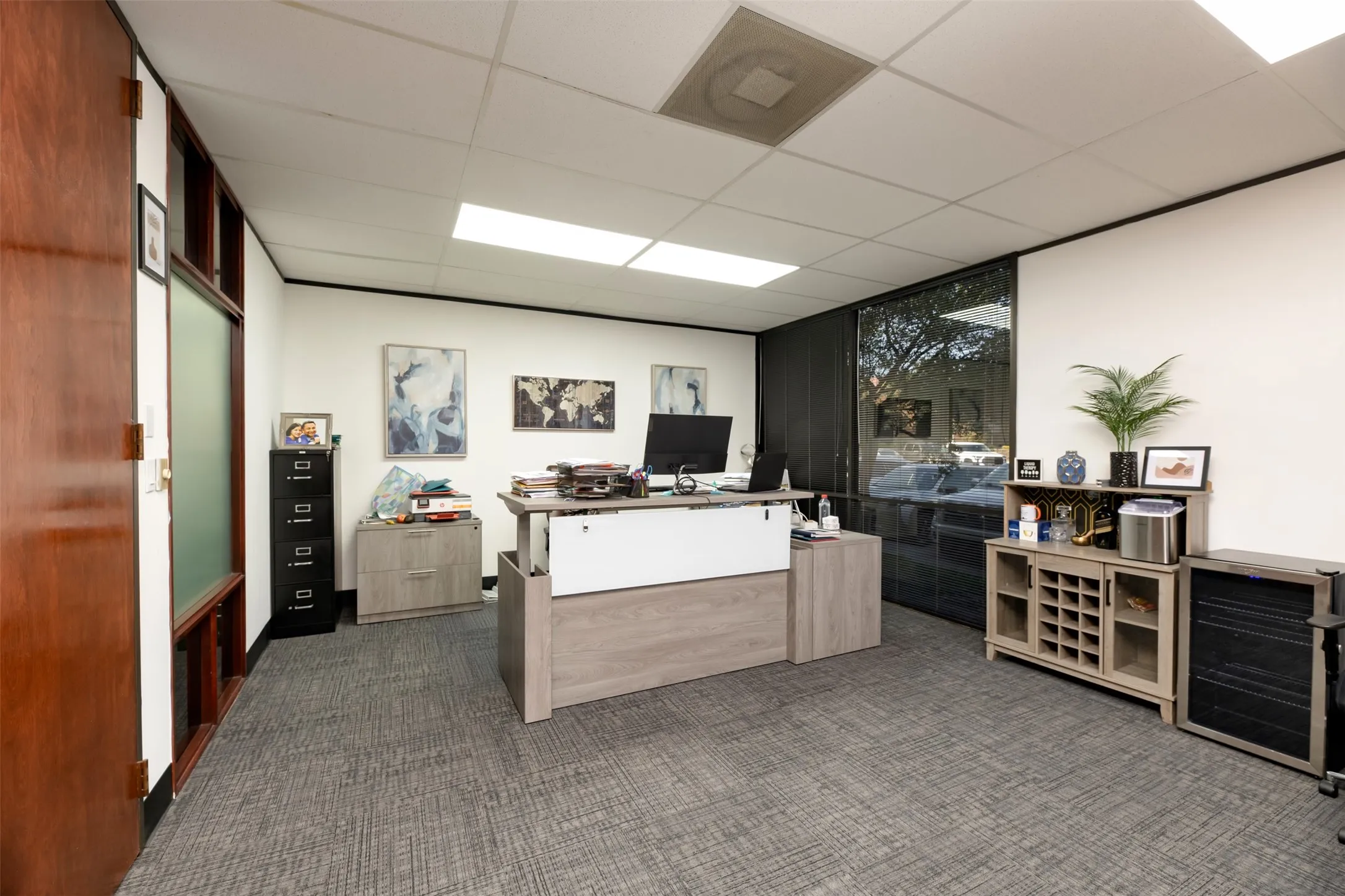 Office area featuring a paneled ceiling