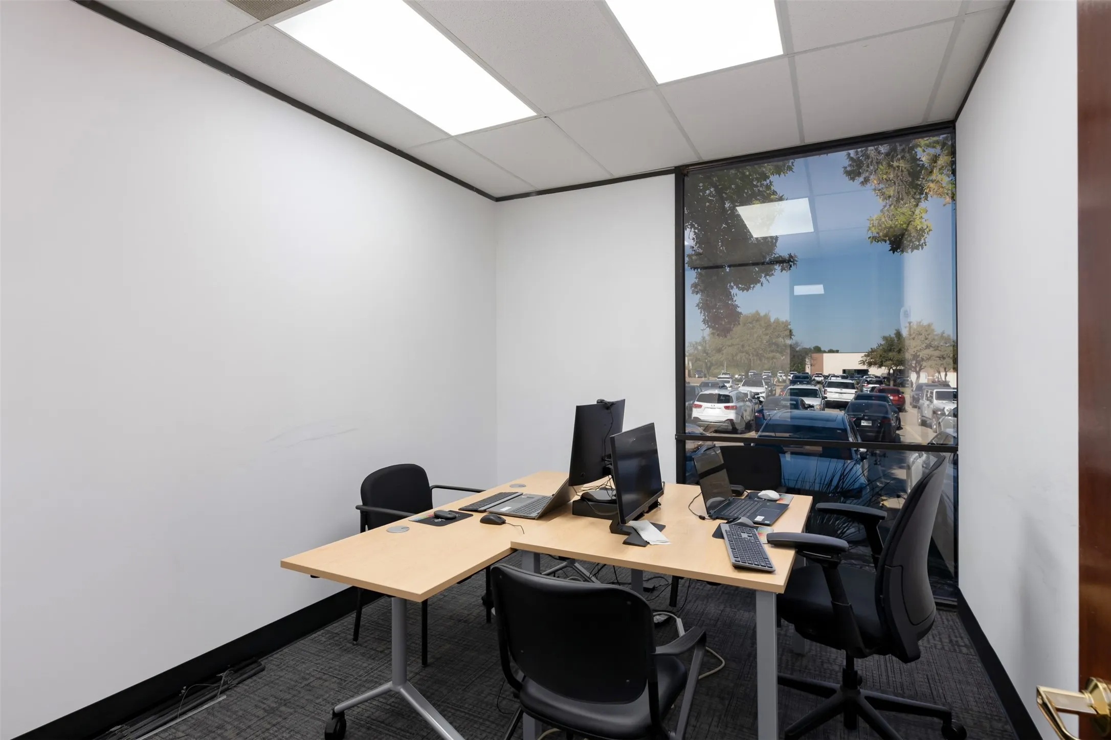 Office featuring a paneled ceiling
