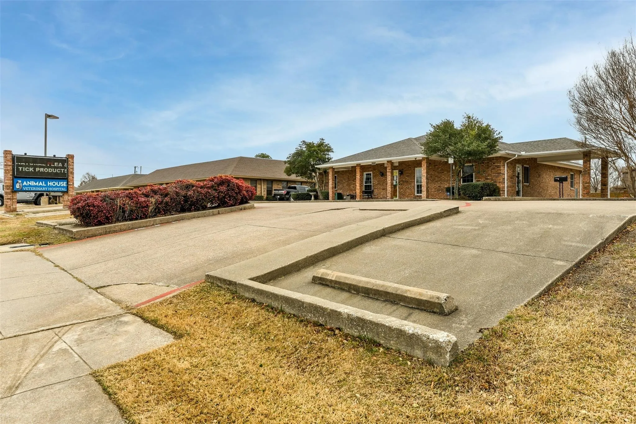 View of home's community with uncovered parking