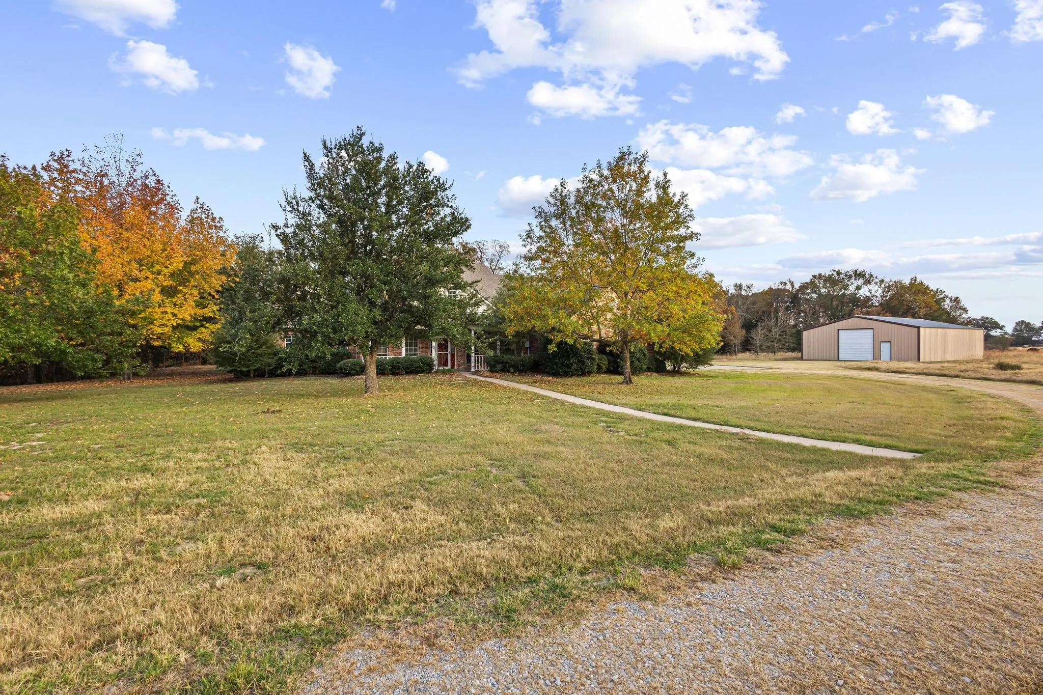 Front of home with the concrete sidewalk