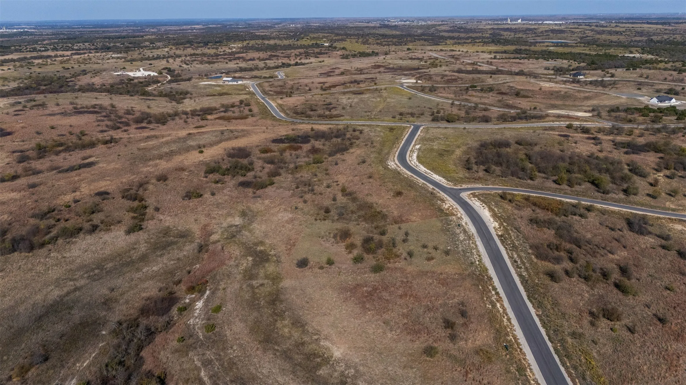 Aerial view of property's location featuring rural landscape