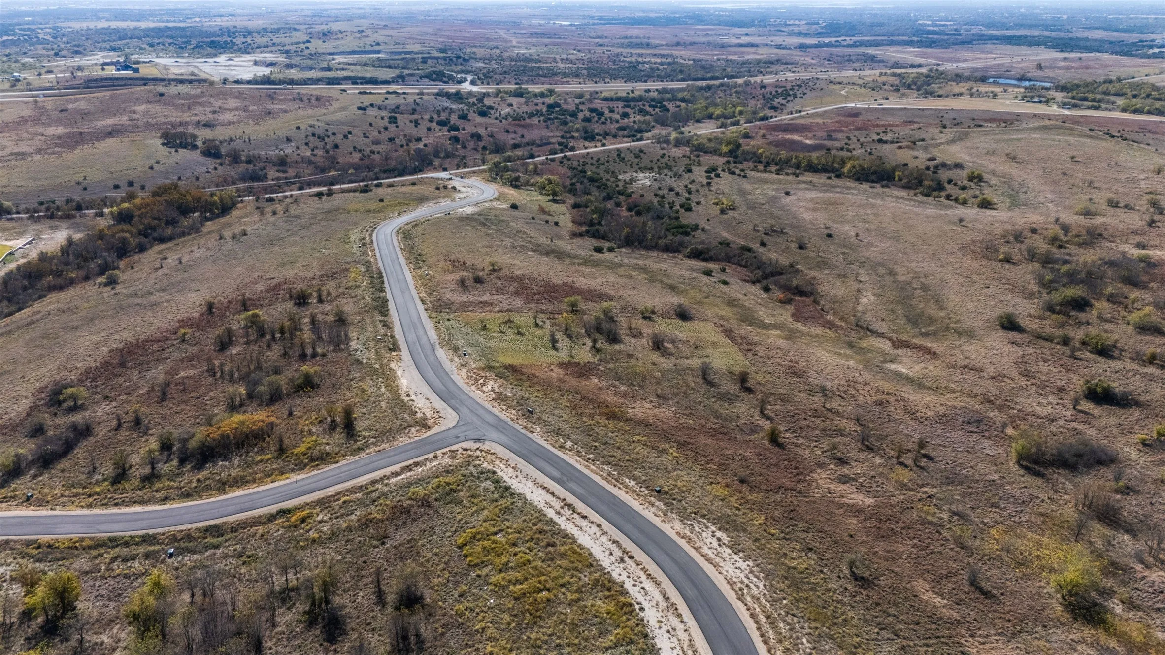 Aerial overview of property's location with rural landscape