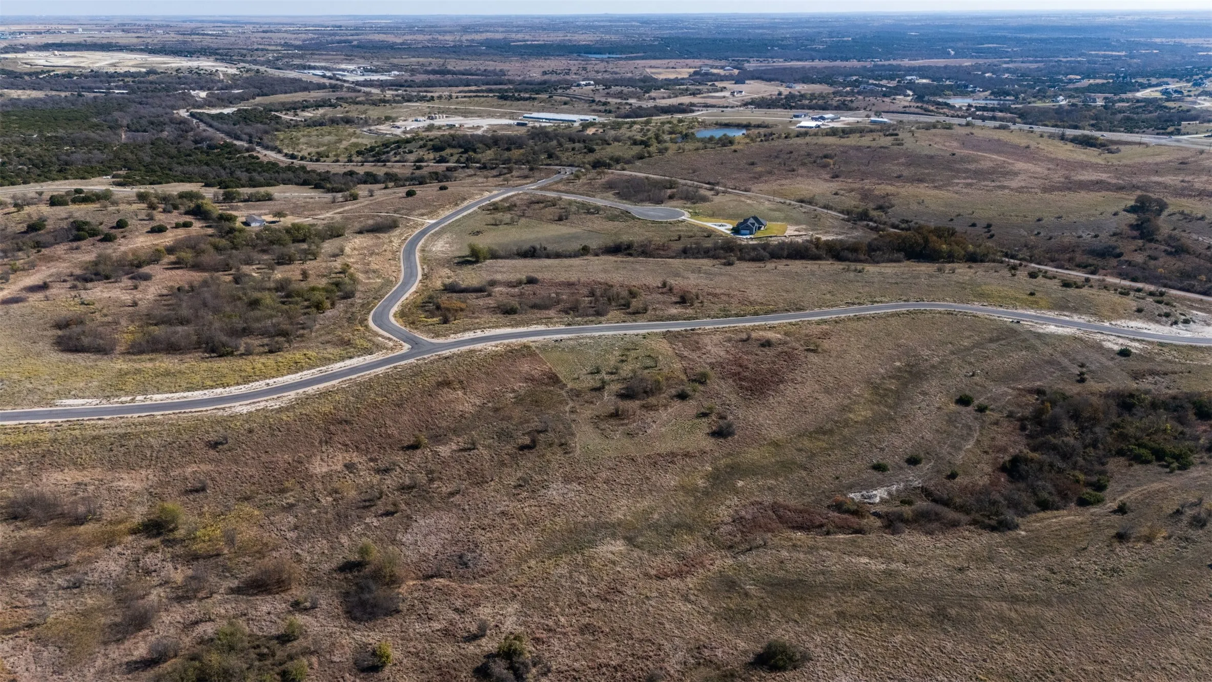 Aerial overview of property's location featuring rural landscape