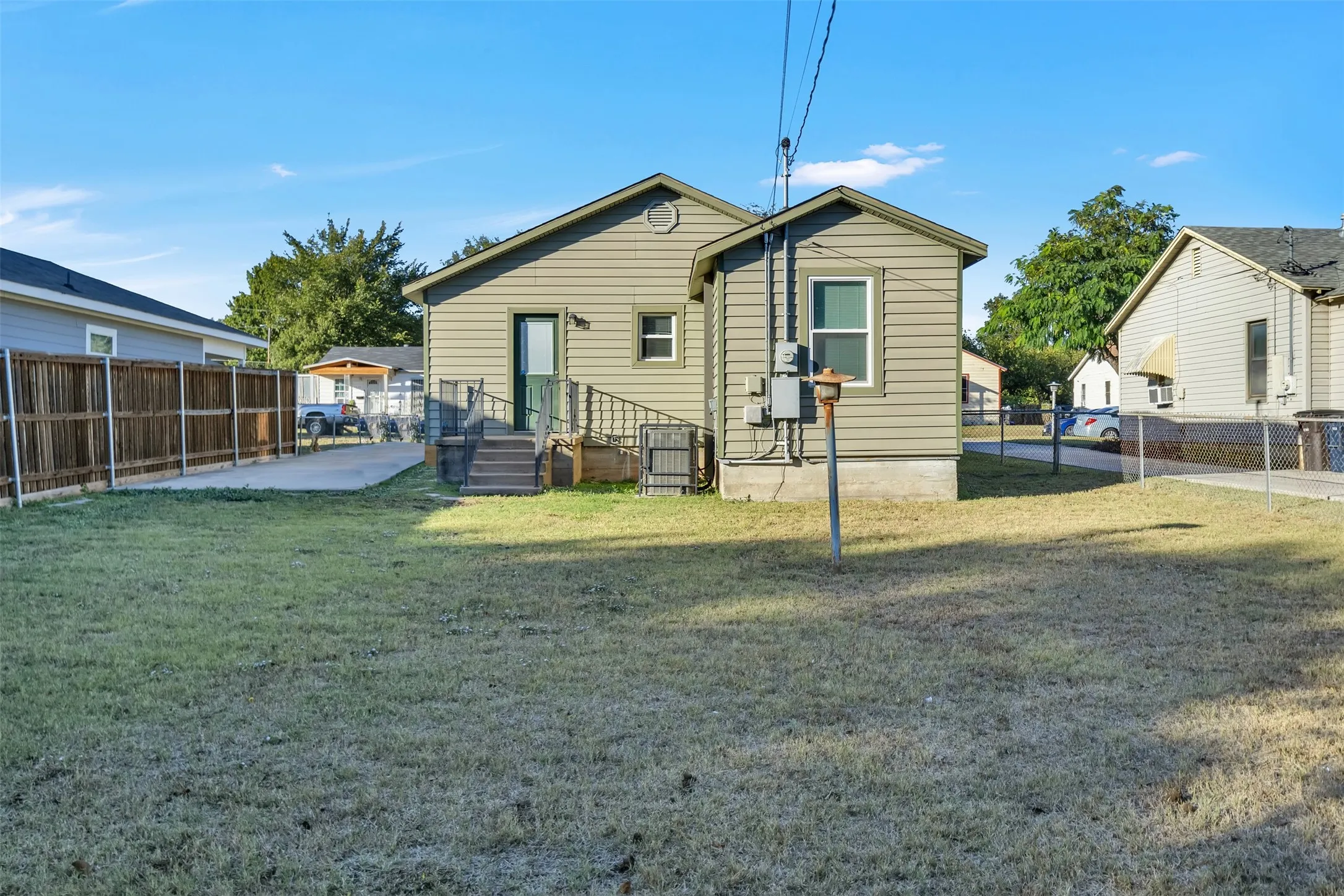 Back of house featuring a patio area and a fenced backyard