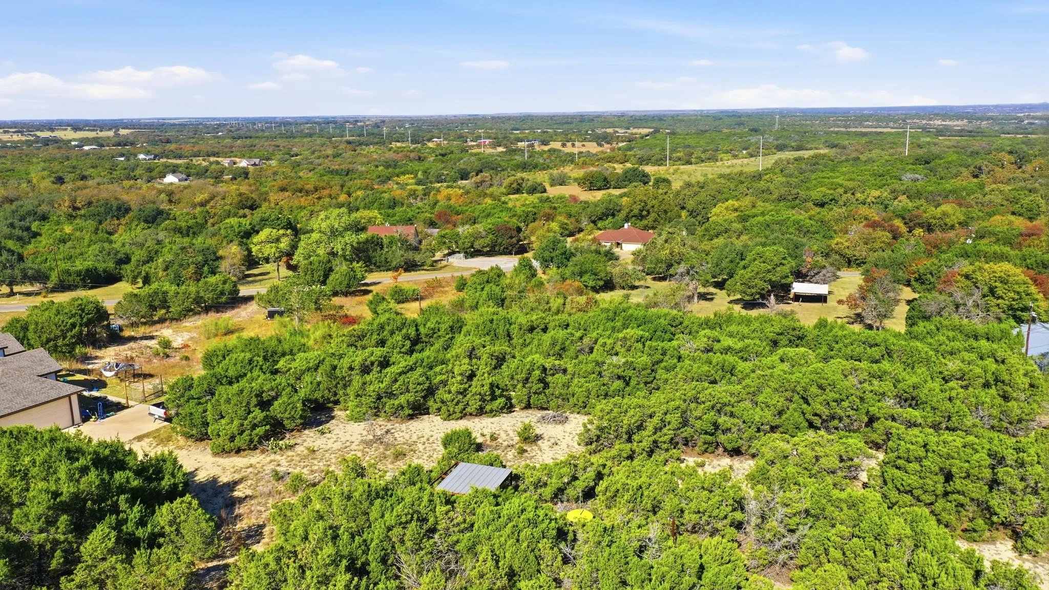 Drone / aerial view of a heavily wooded area
