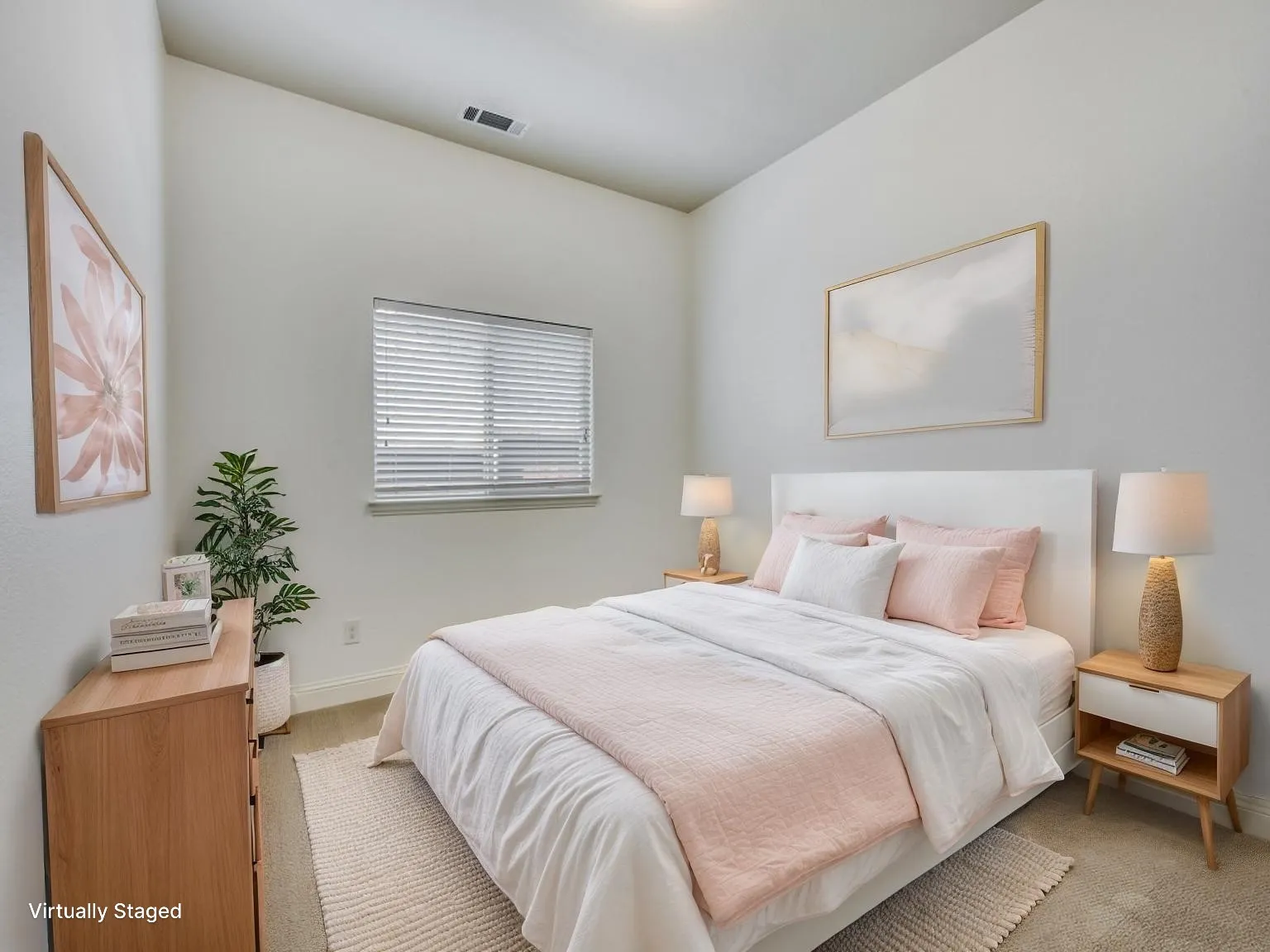 Spacious bedroom featuring light neutral wall tones, carpeted flooring, a window with blinds, and a vaulted ceiling
