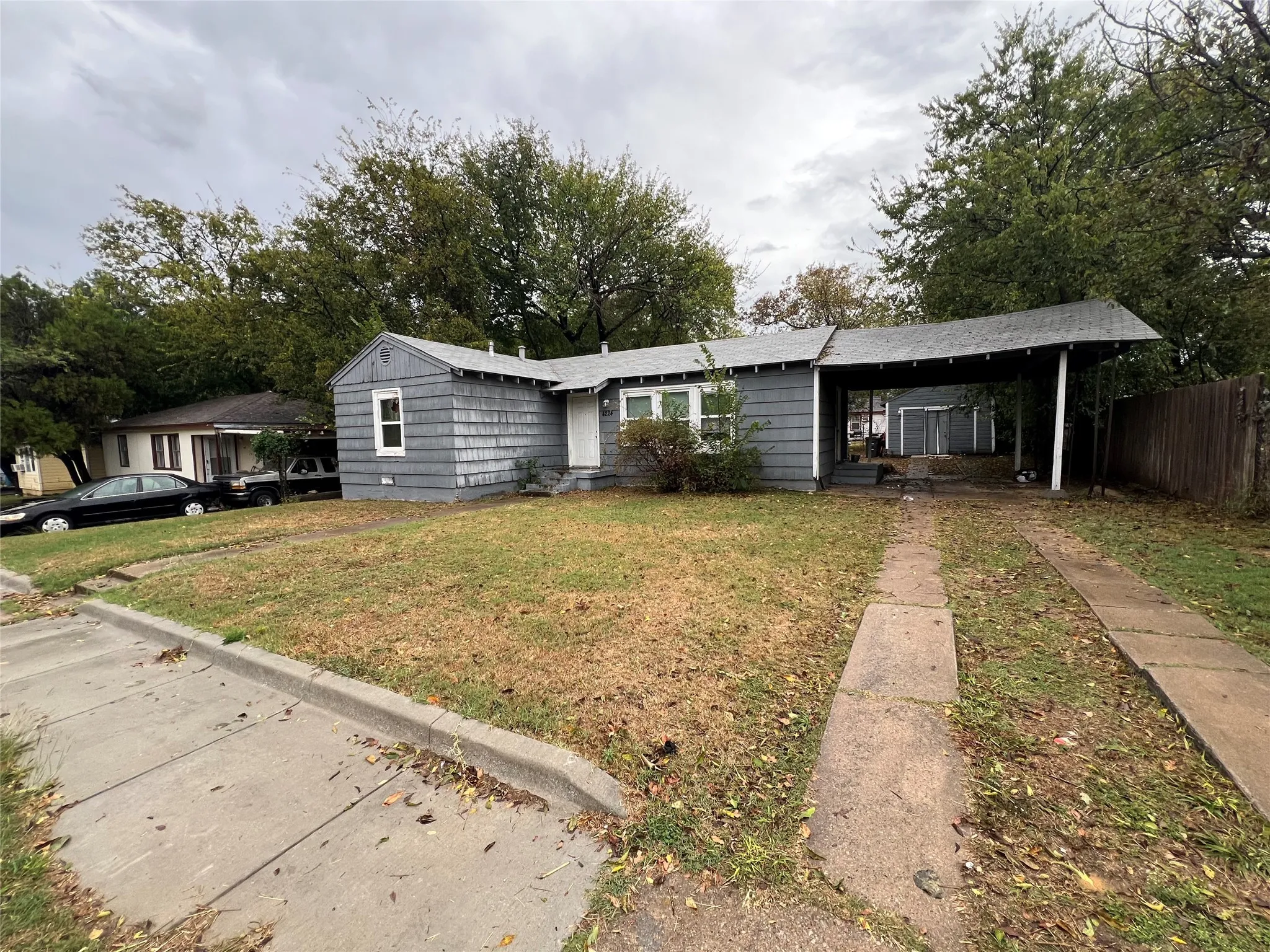 Ranch-style home with an attached carport