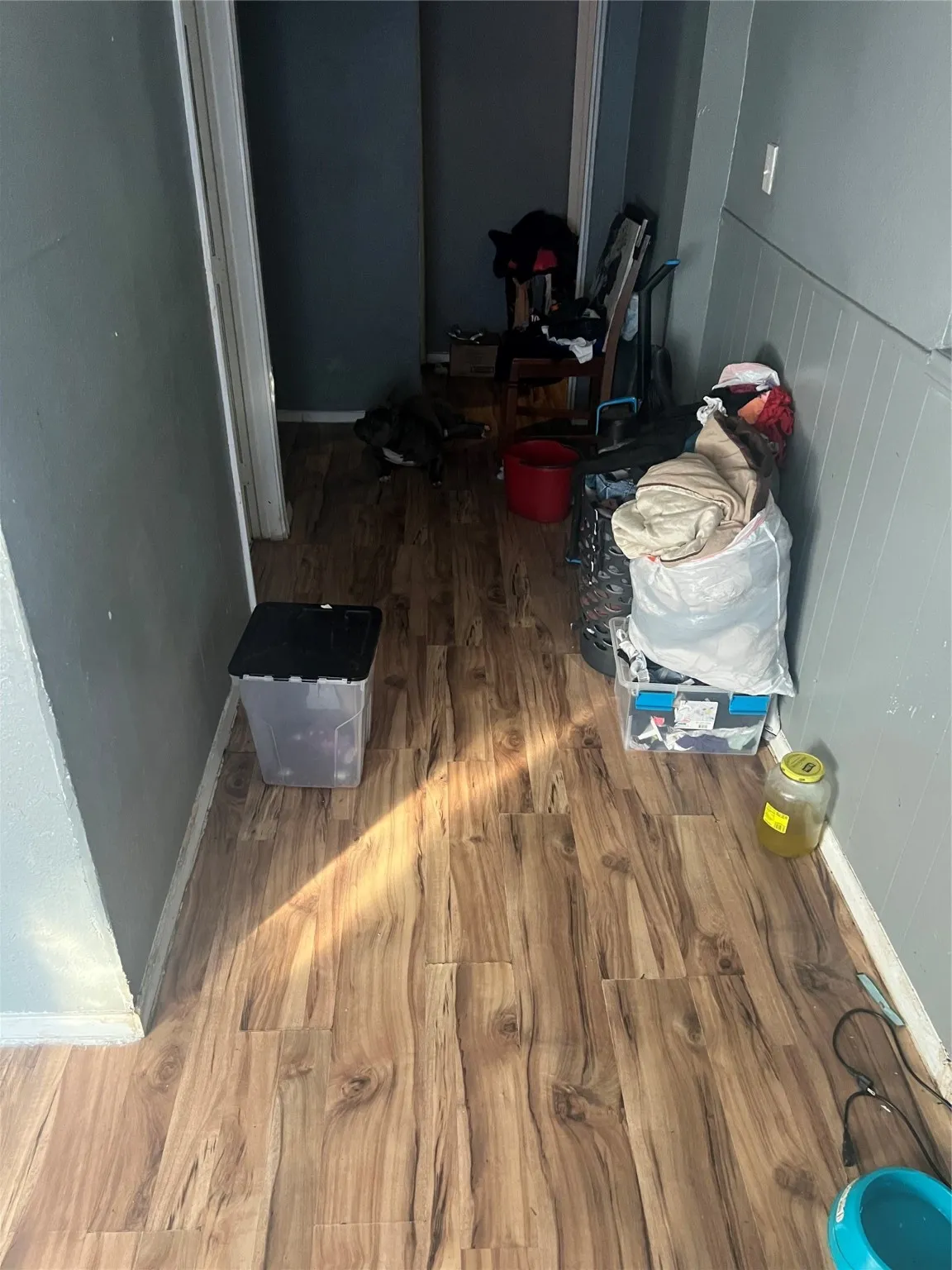 Detailed view of wood finished floors and baseboards