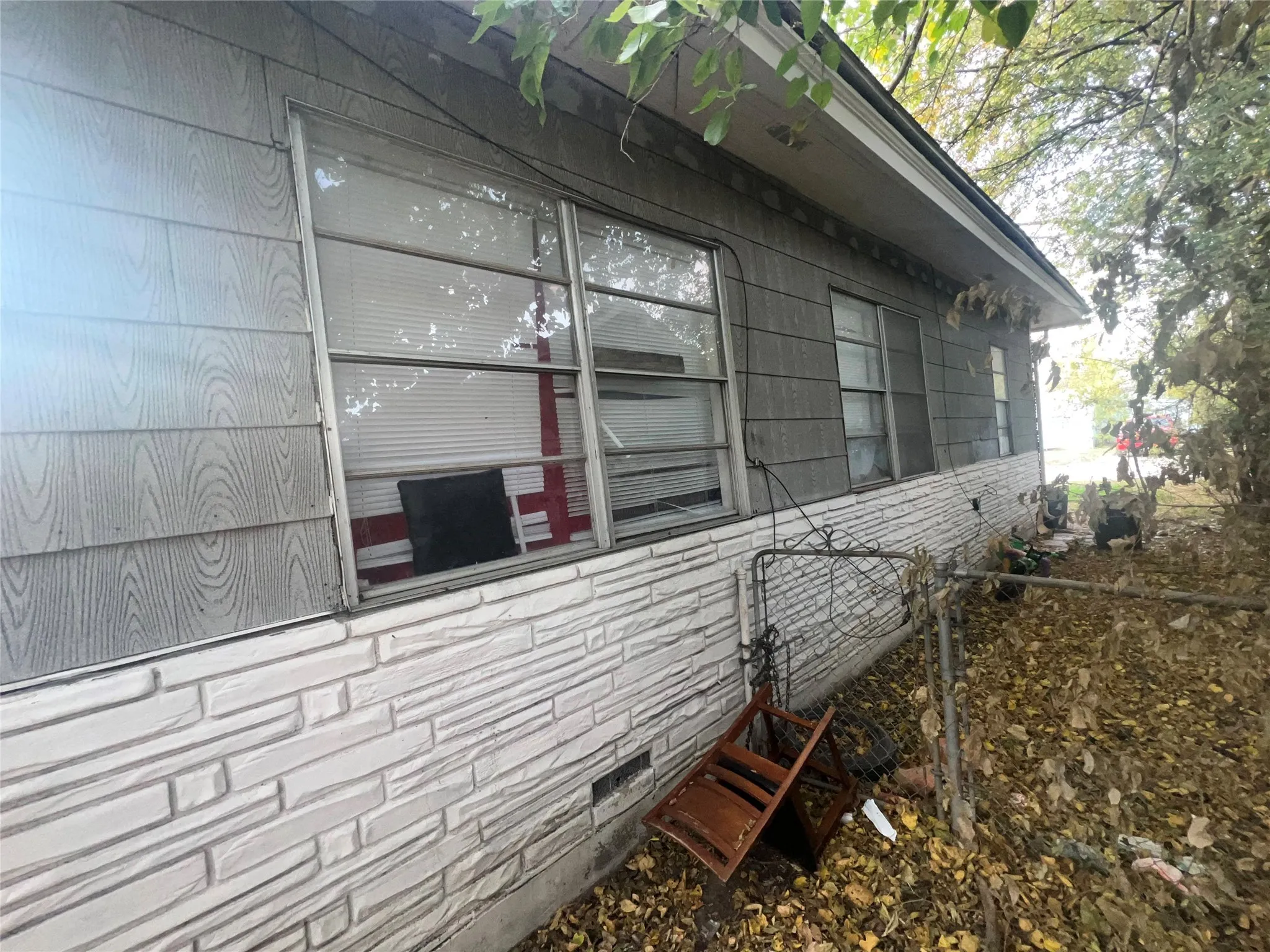 View of side of property featuring crawl space