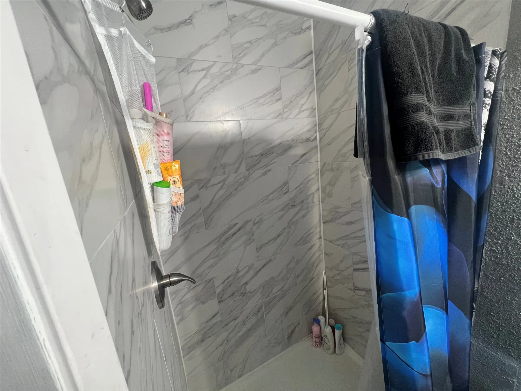 Bathroom with a shower stall