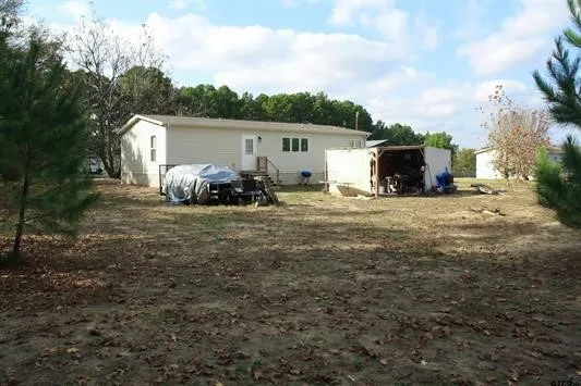 Back of property featuring a patio