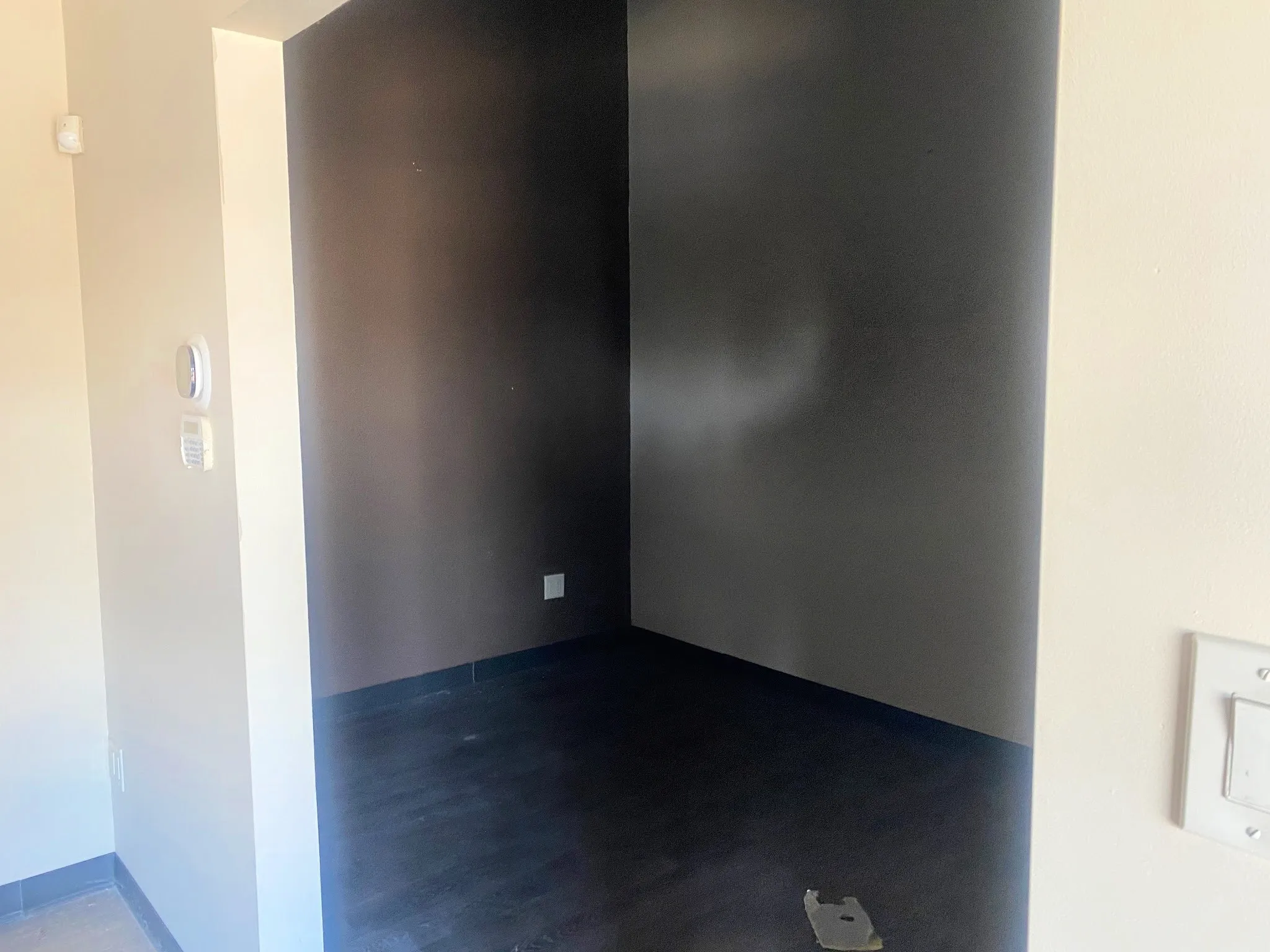 Spare room featuring baseboards