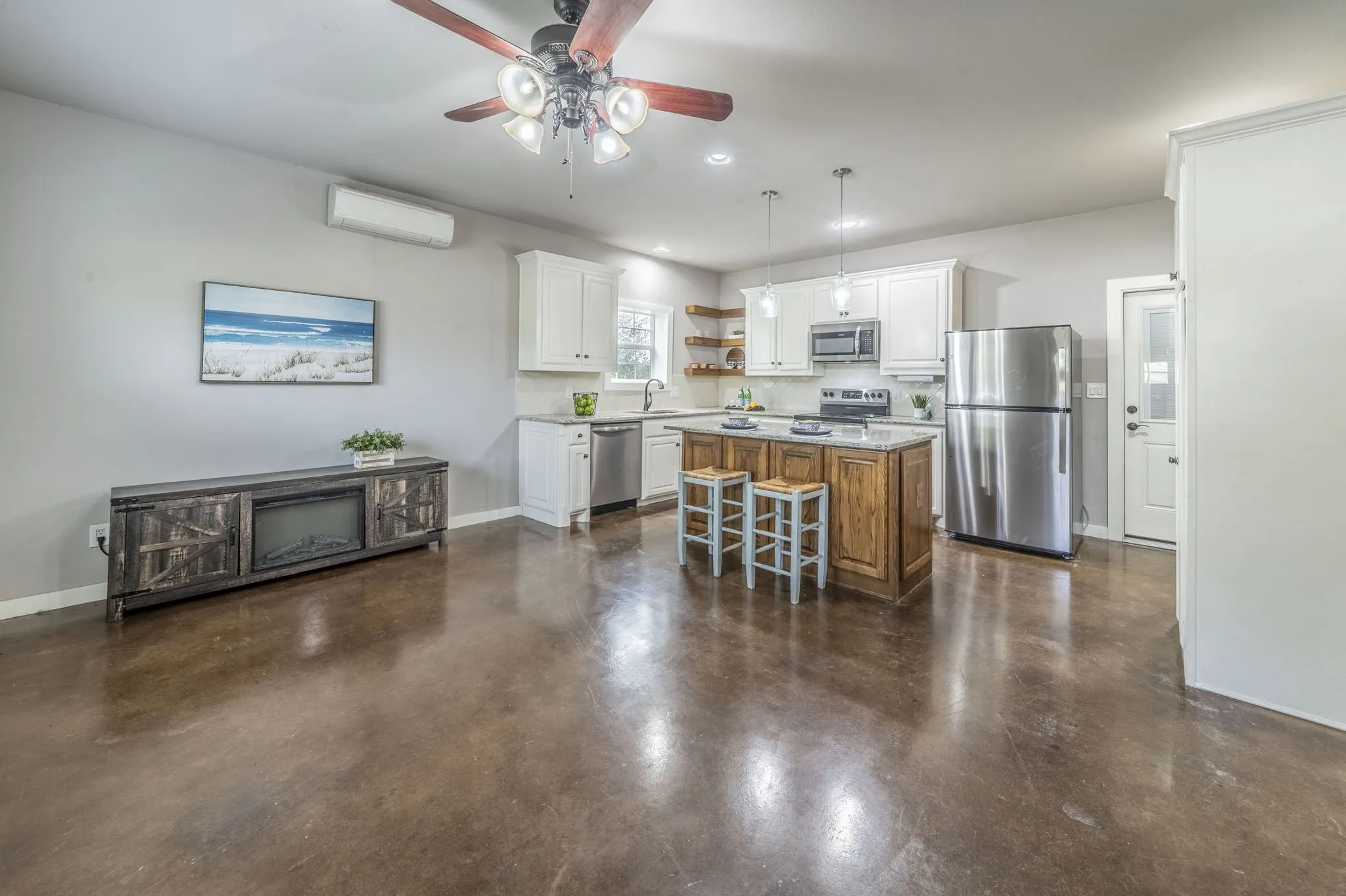Living room and kitchen island in secondary unit