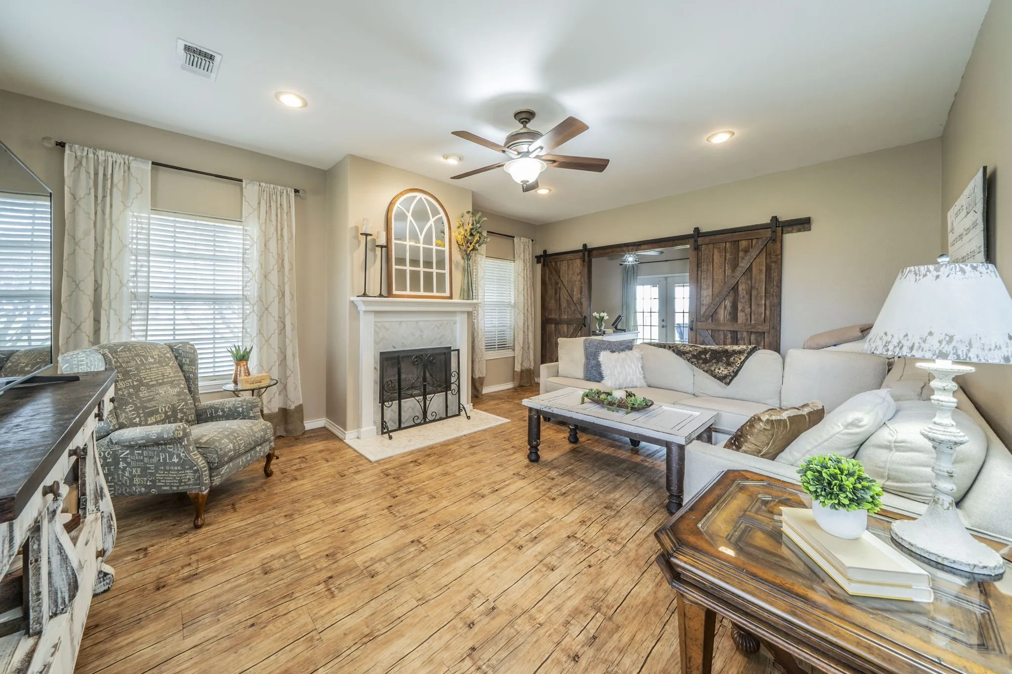 Living room with wood burning fireplace