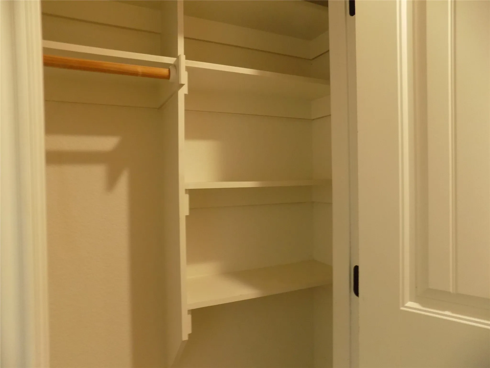 Closet at laundry entry door.