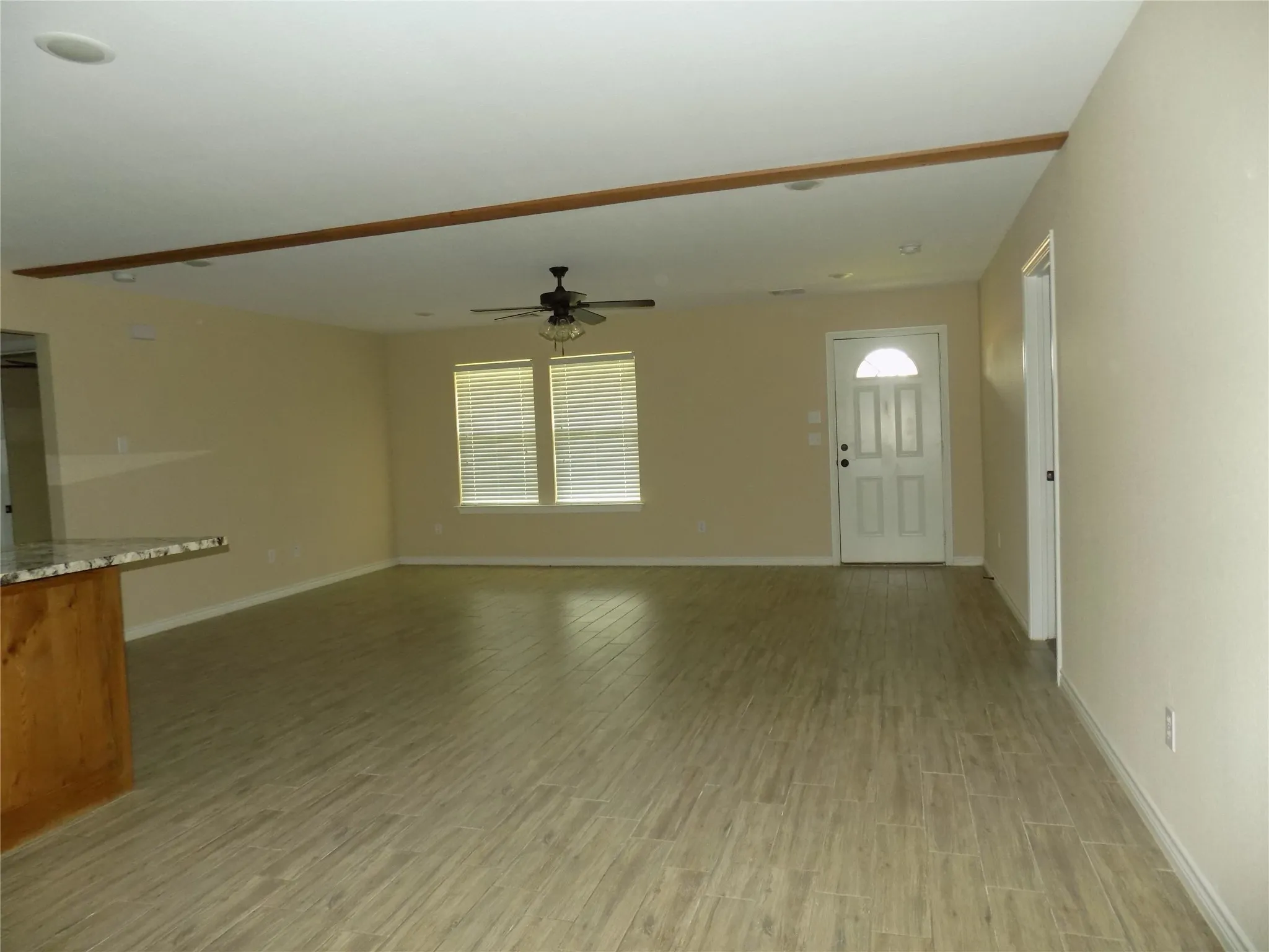 From kitchen, enjoy the view of the living room with the open floor appeal.