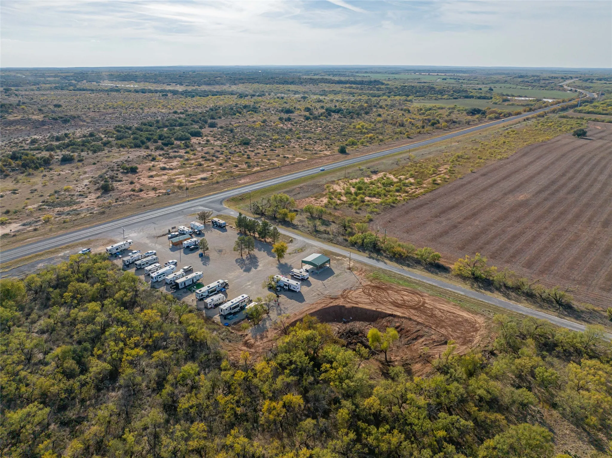 Aerial view of property's location featuring rural landscape
