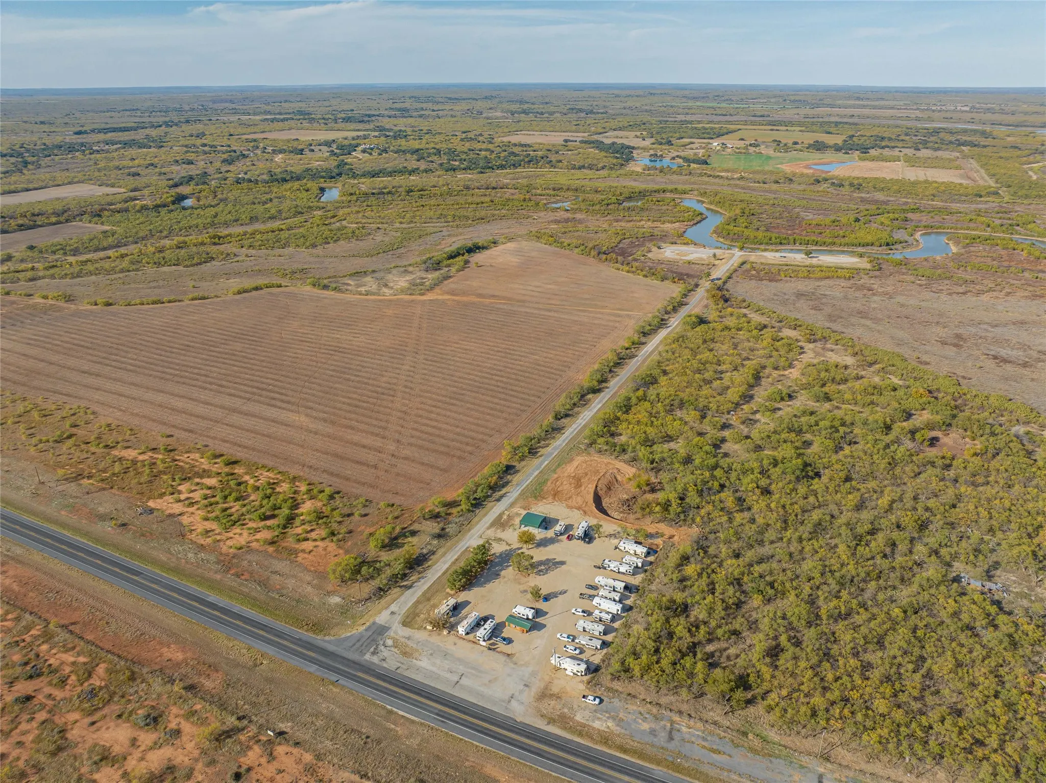 View of property location featuring rural landscape and a large body of water