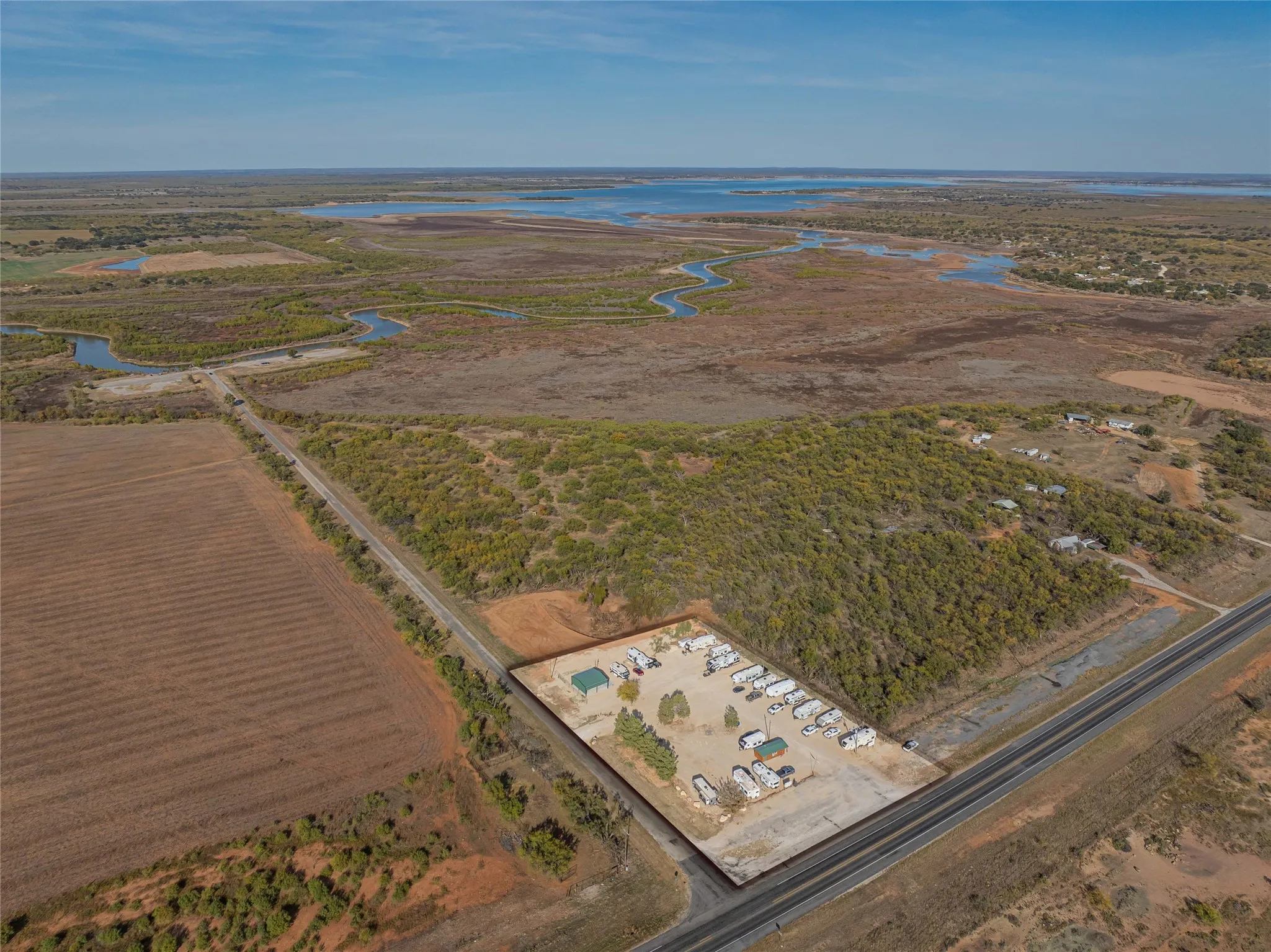 View of property location with a nearby body of water