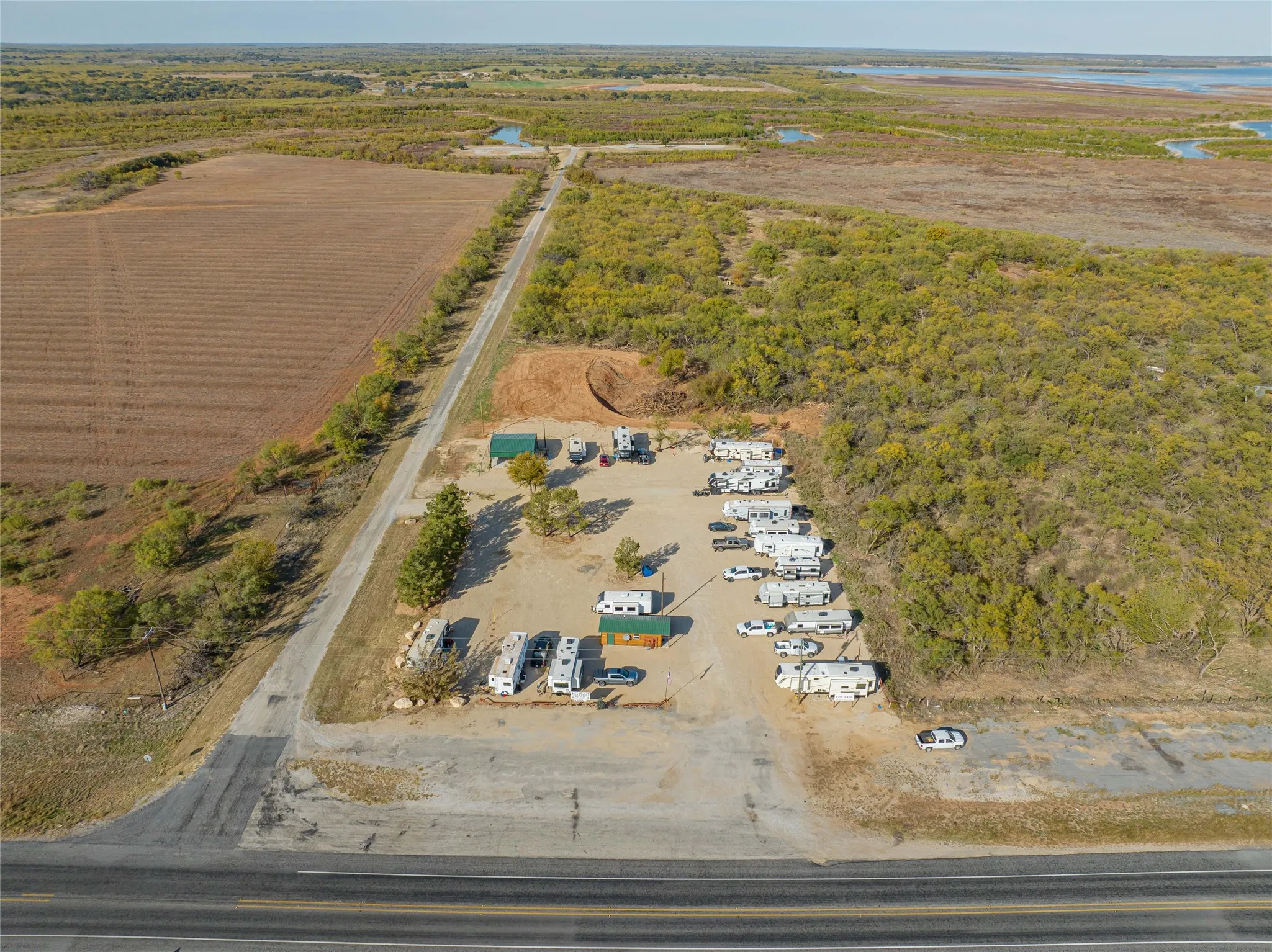 Aerial overview of property's location featuring a nearby body of water