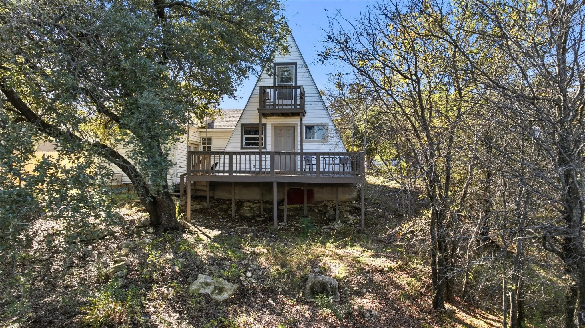Rear view of property featuring a balcony