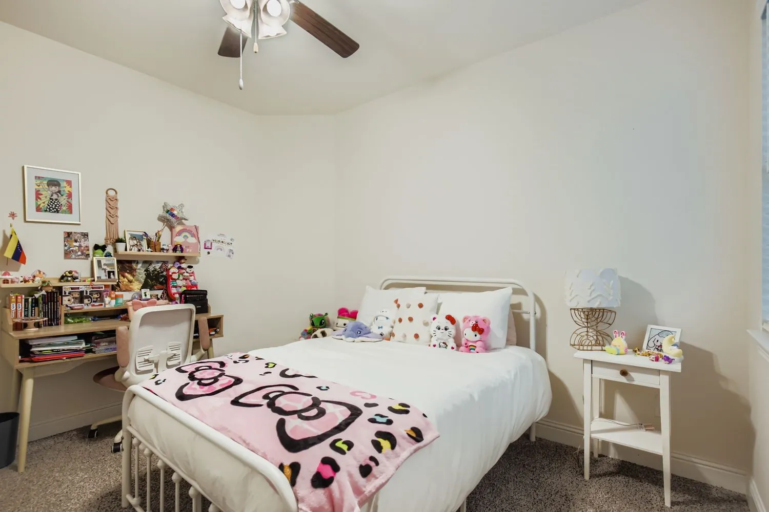 Bedroom featuring carpet flooring and a ceiling fan