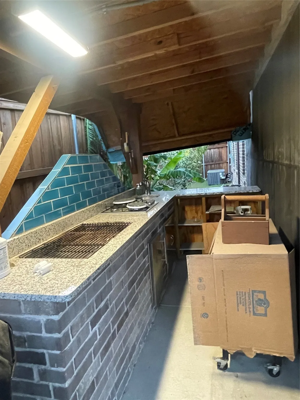 View of patio with exterior kitchen
