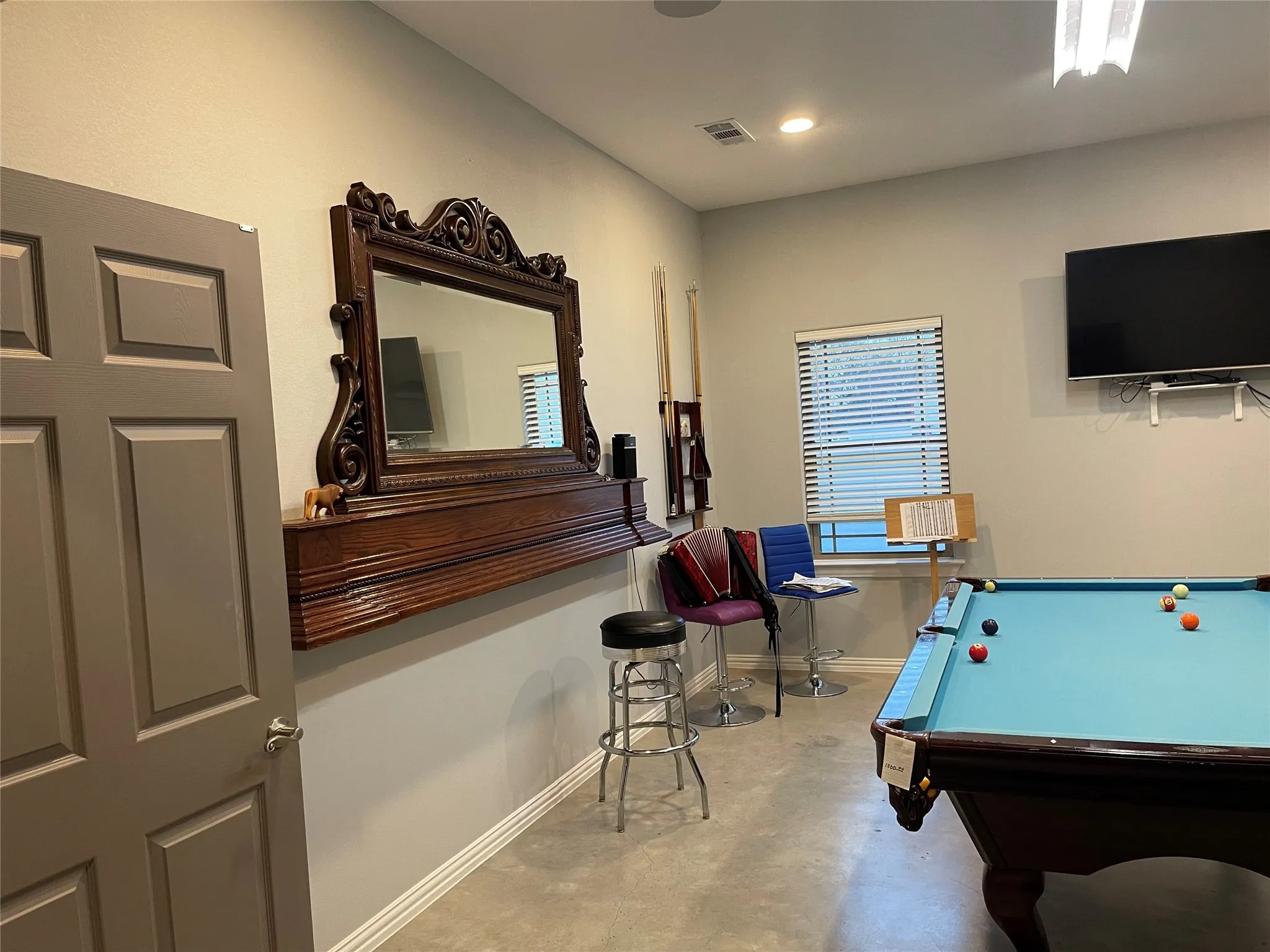 Recreation room with billiards table, concrete flooring, and recessed lighting