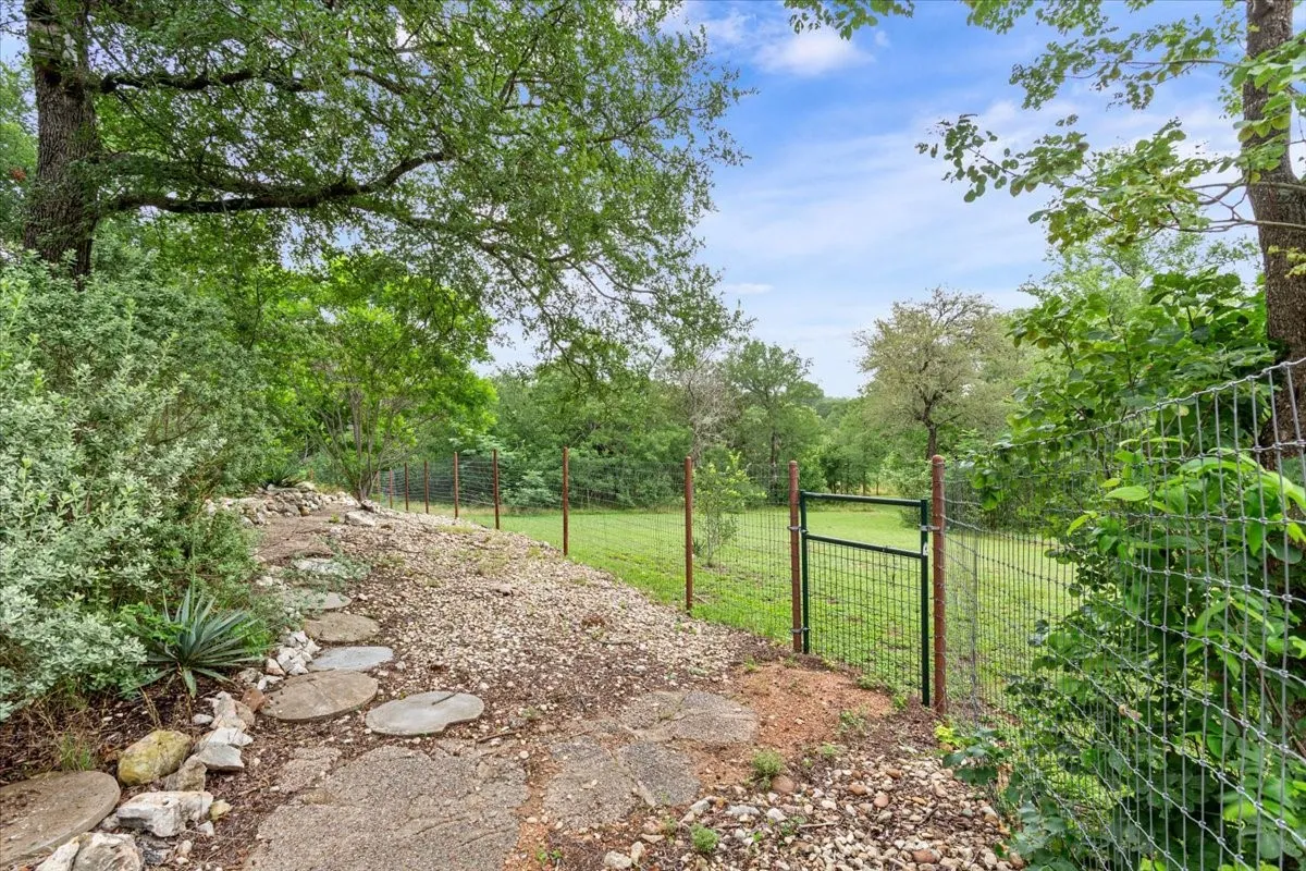 View of yard with a gate