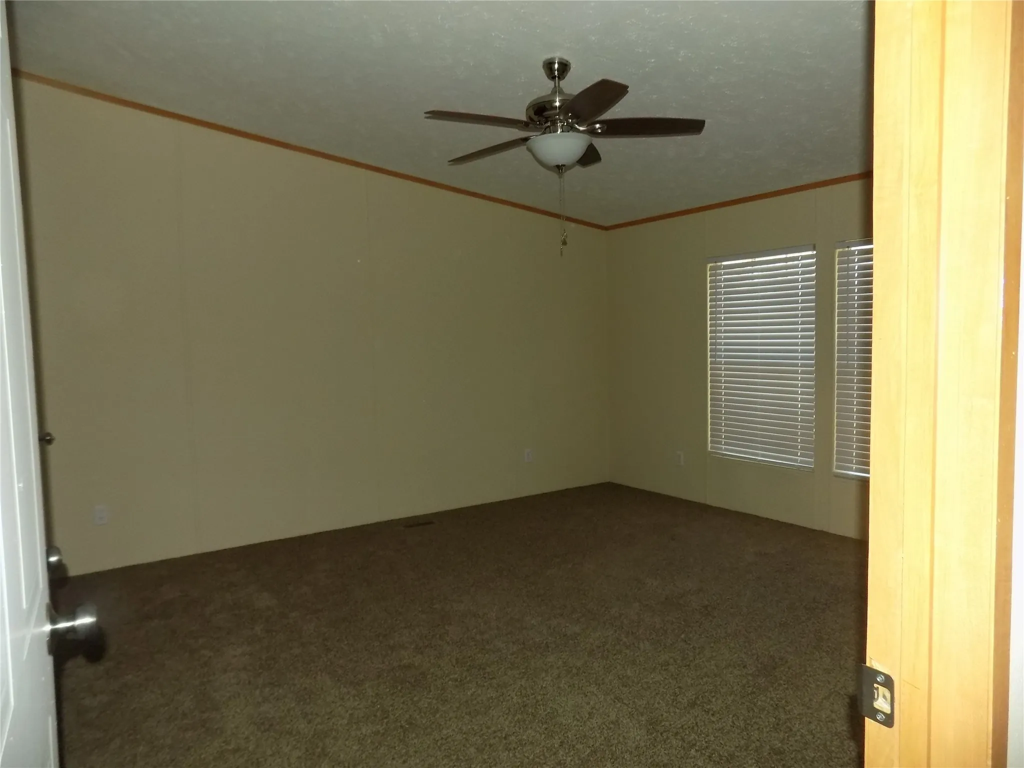 Primary bedroom with wonderful windows and an ensuite bathroom.