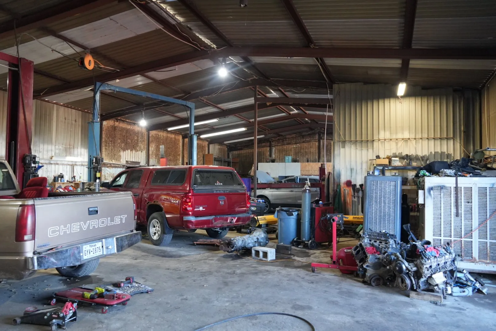 Garage featuring metal wall