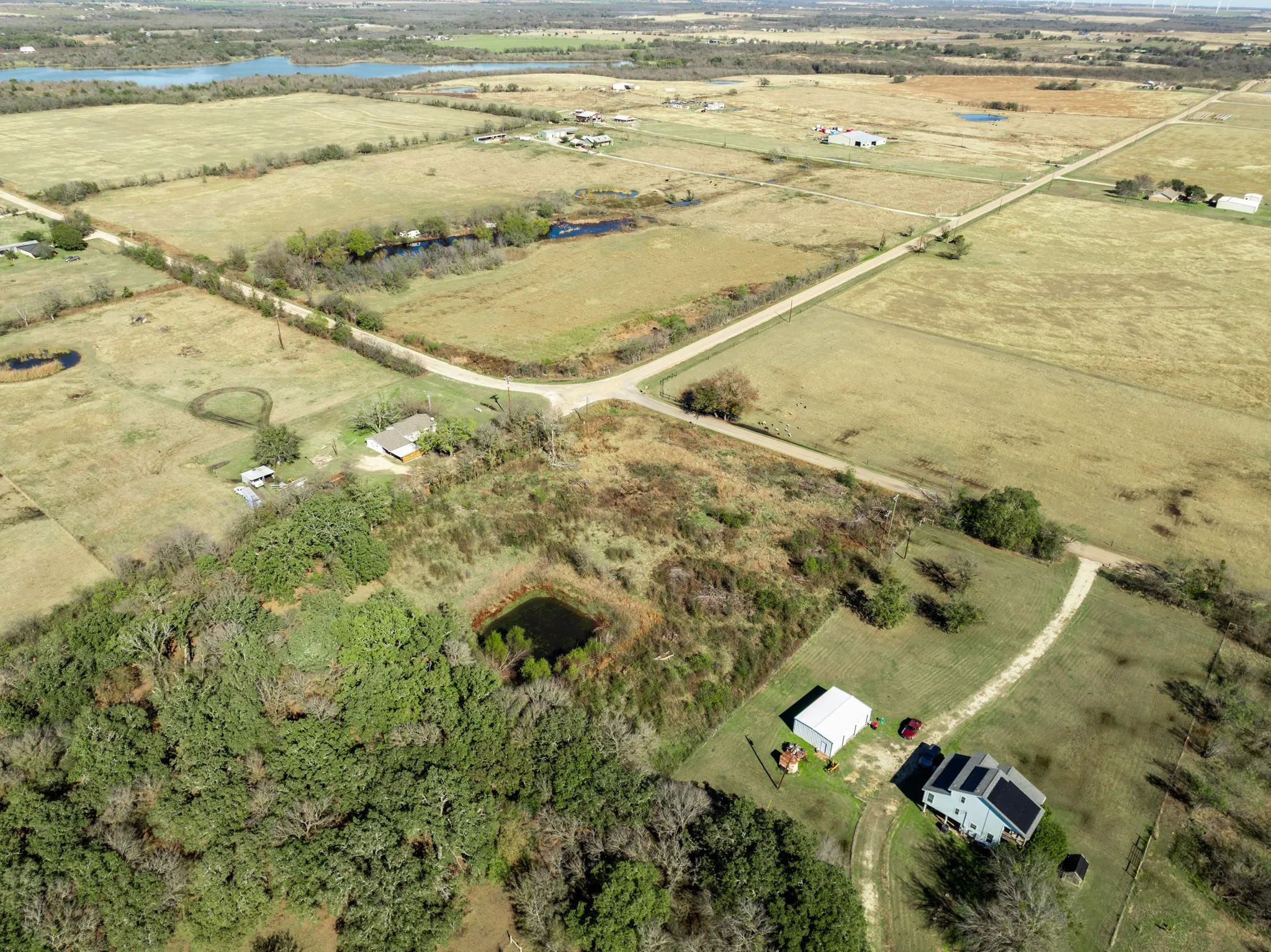 View of property location featuring rural landscape and a large body of water