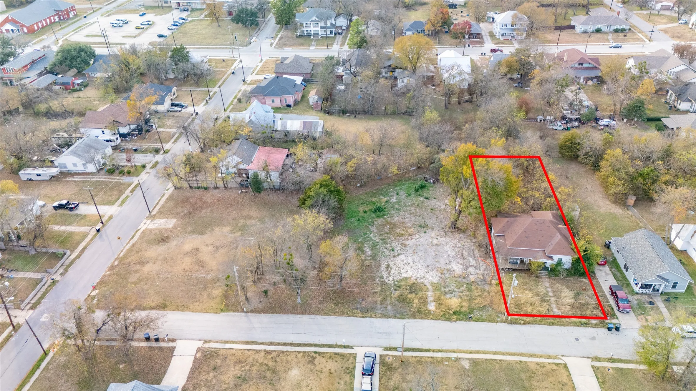 Aerial perspective of suburban area with property boundaries highlighted