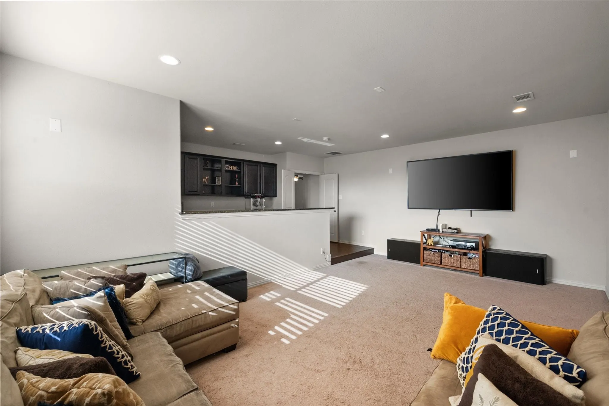 Large media room with wet bar