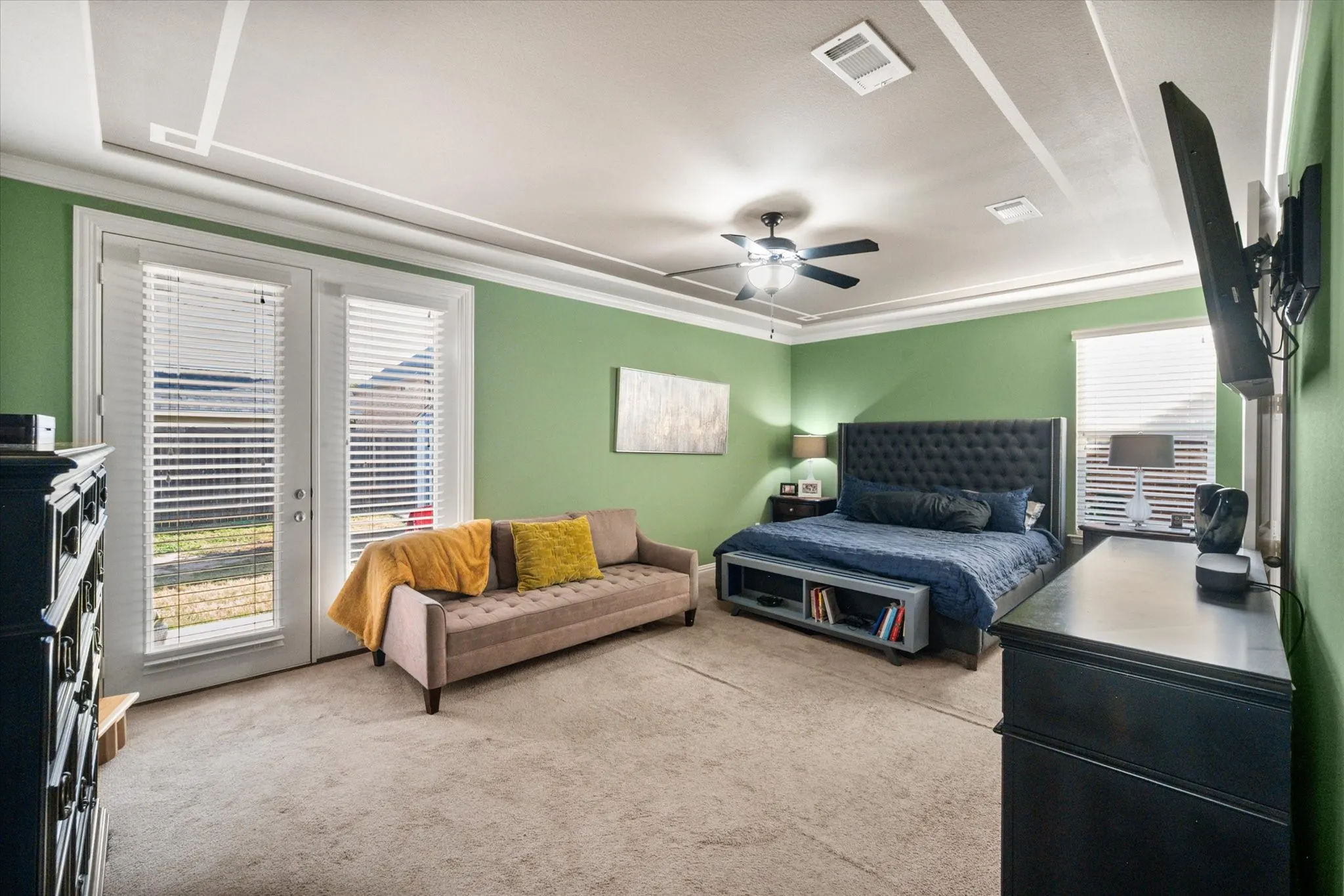 Primary bedroom with backyard access (perfect for a pool!). Seller is offering a flooring allowance to make this YOUR home!