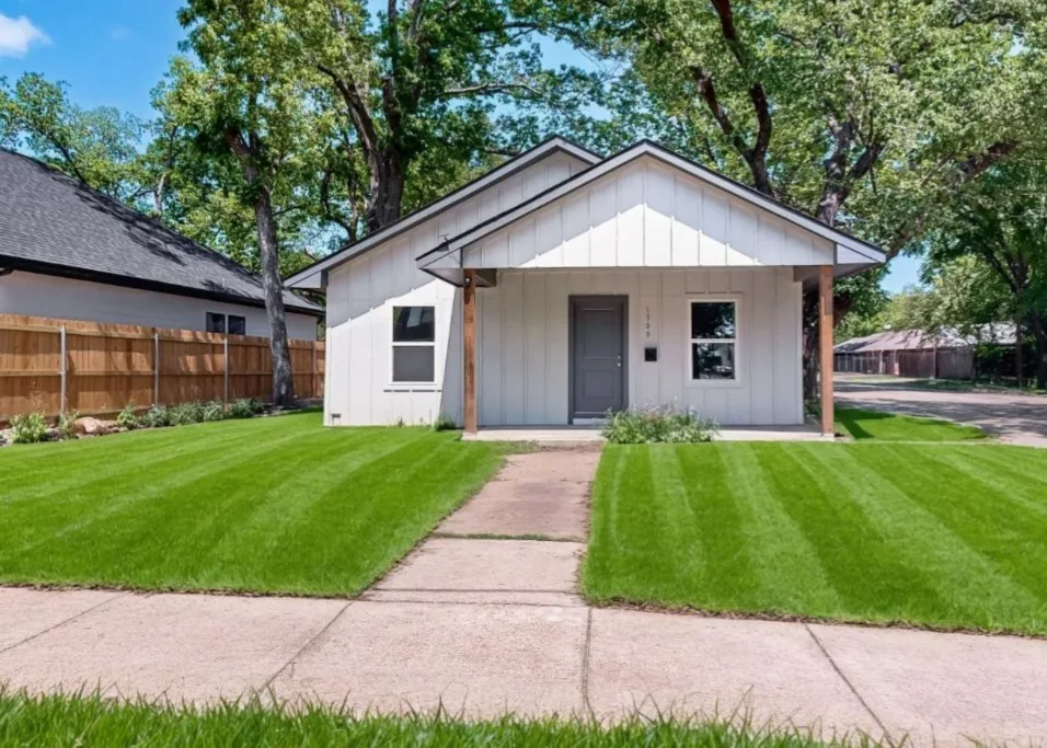 View of front of house with a porch and board and batten siding
