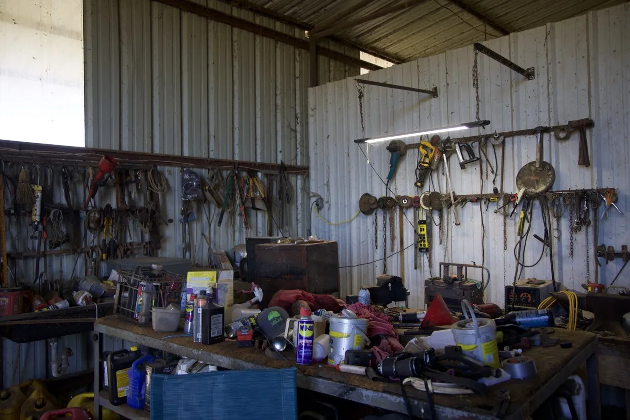 Garage featuring metal wall