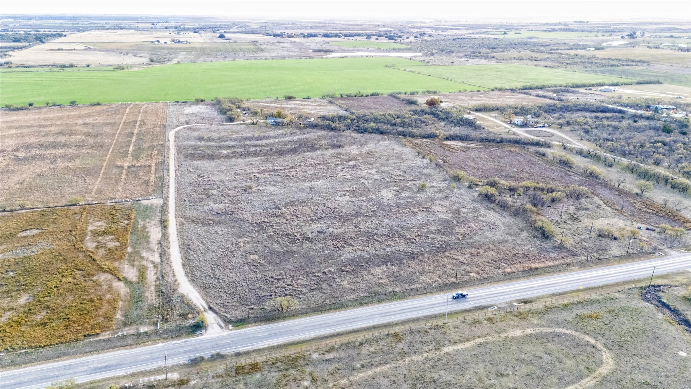 Aerial view of property's location featuring rural landscape