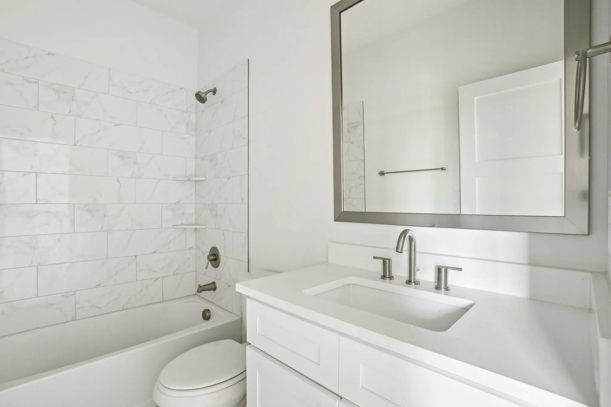 Full bathroom with tub / shower combination and vanity