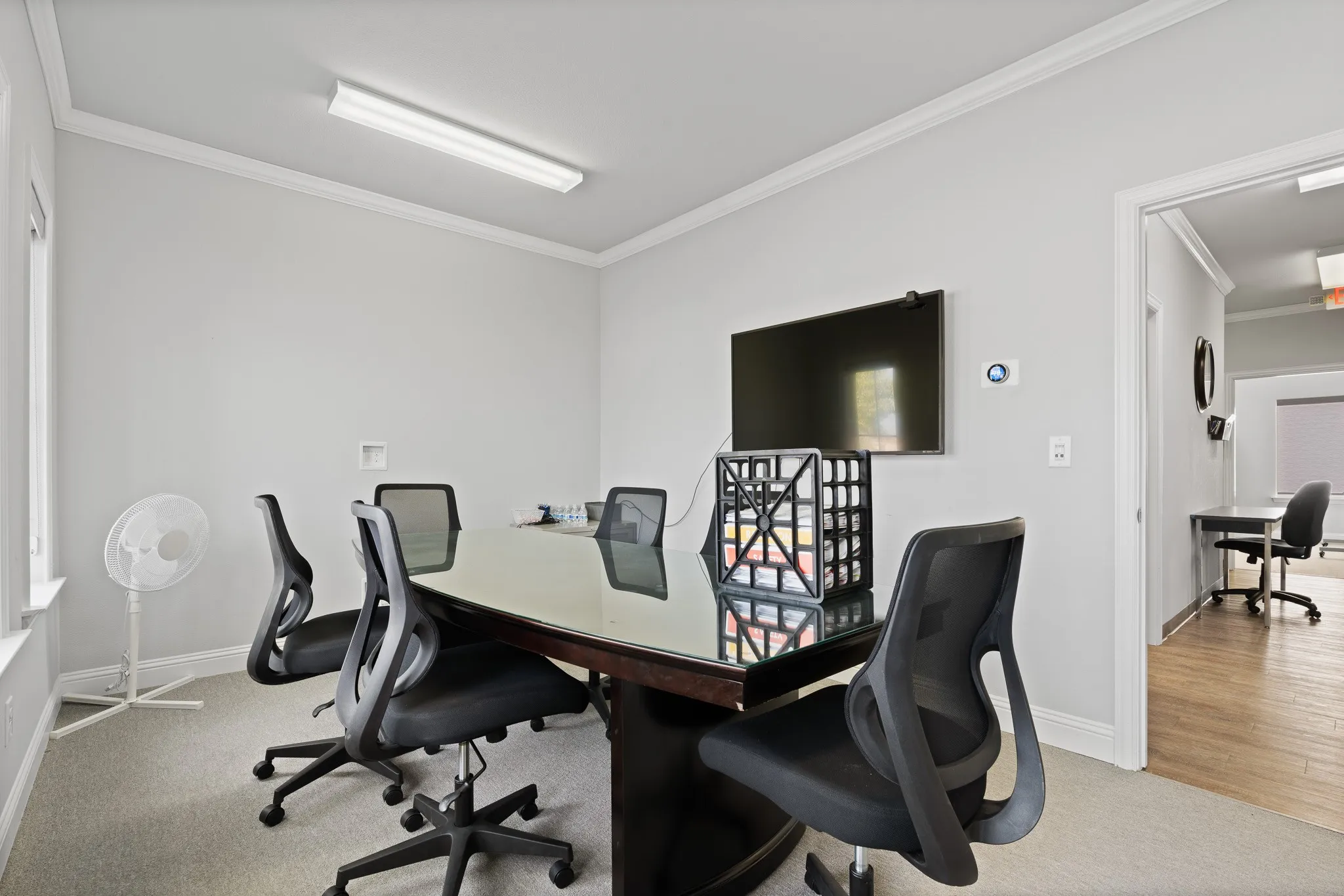 Another view of the conference room, plenty of wall space for TV's or white boards