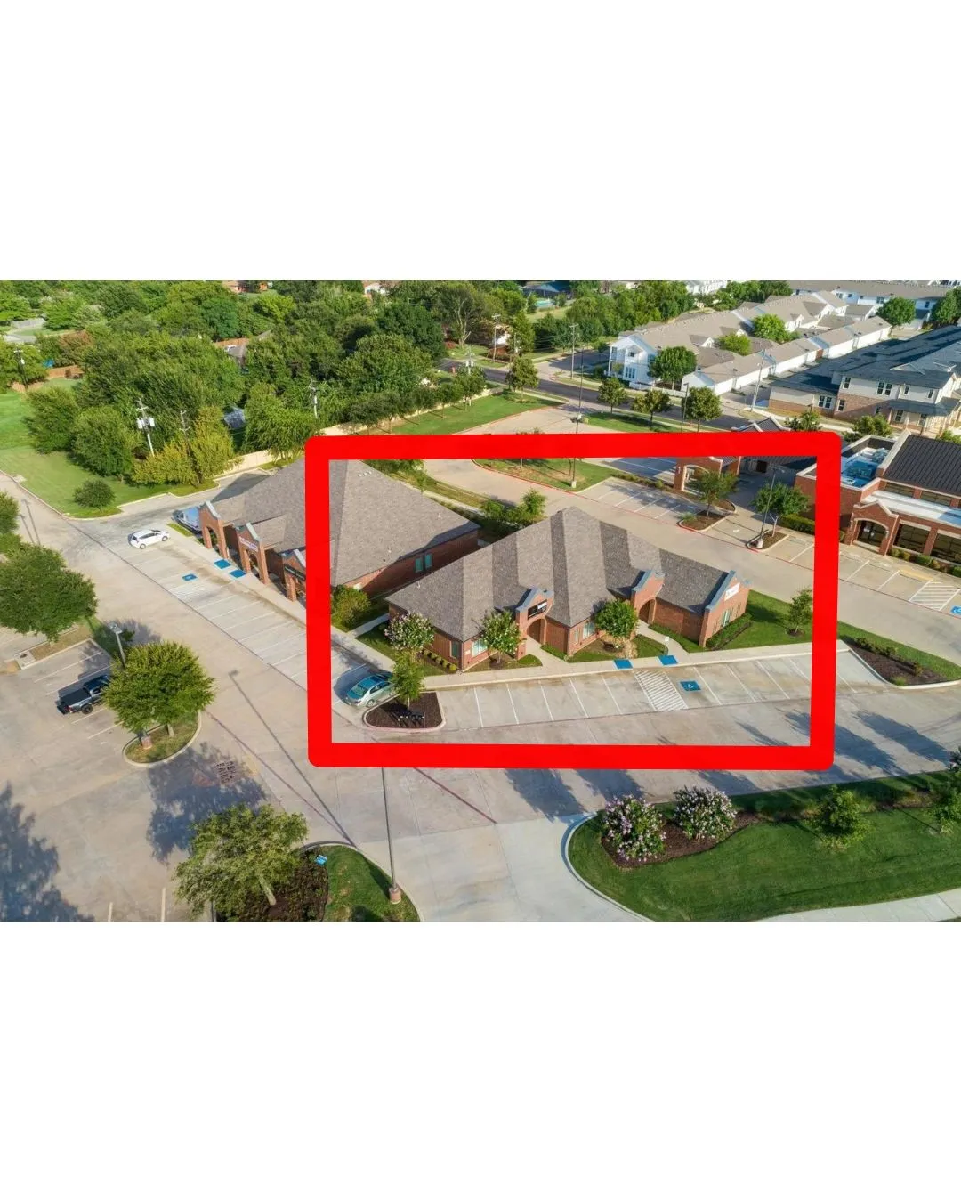Aerial perspective of building with property parcel outlined - lease side is left side of building