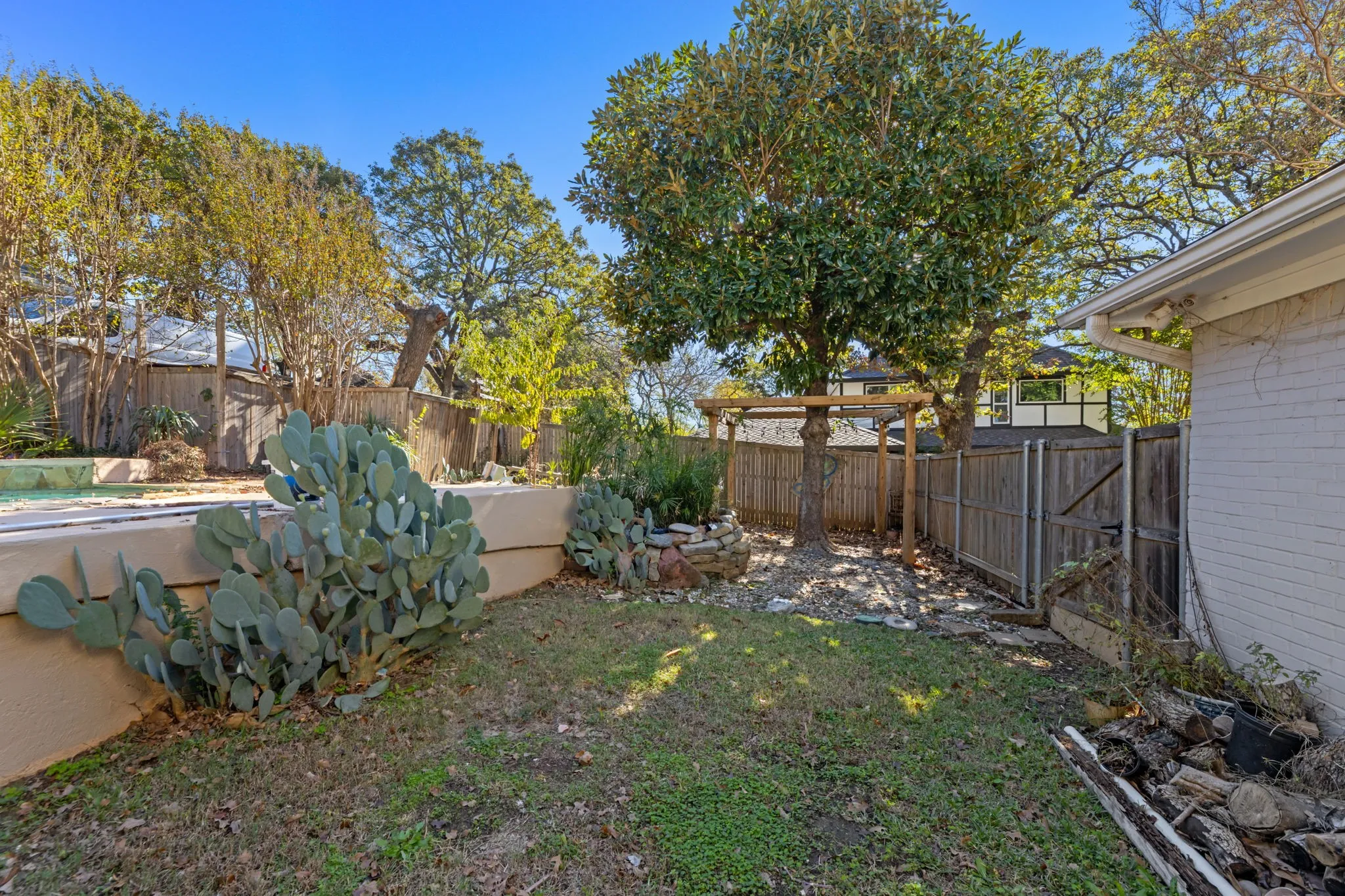 View of fenced backyard