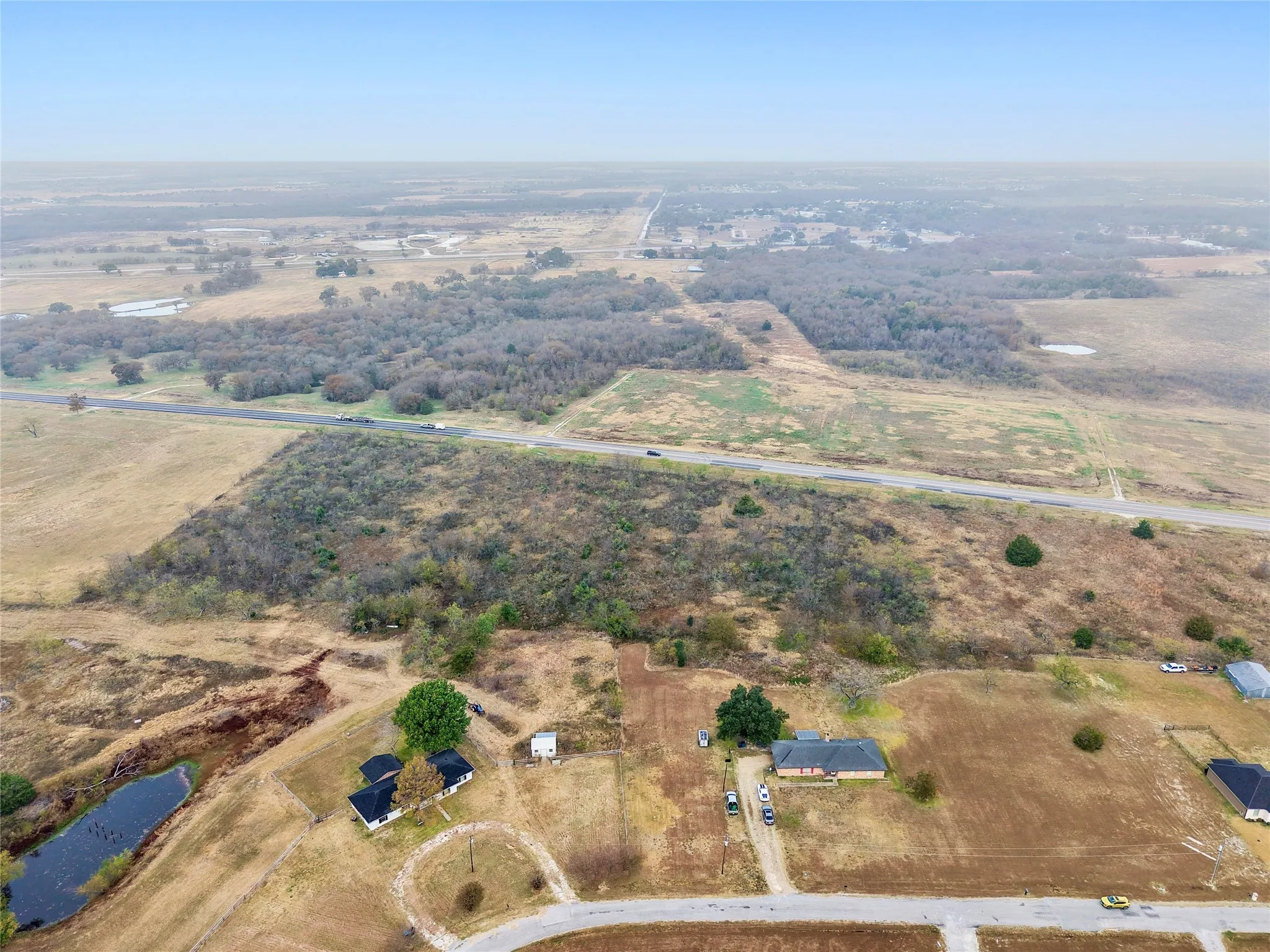 Aerial view of property's location with rural landscape
