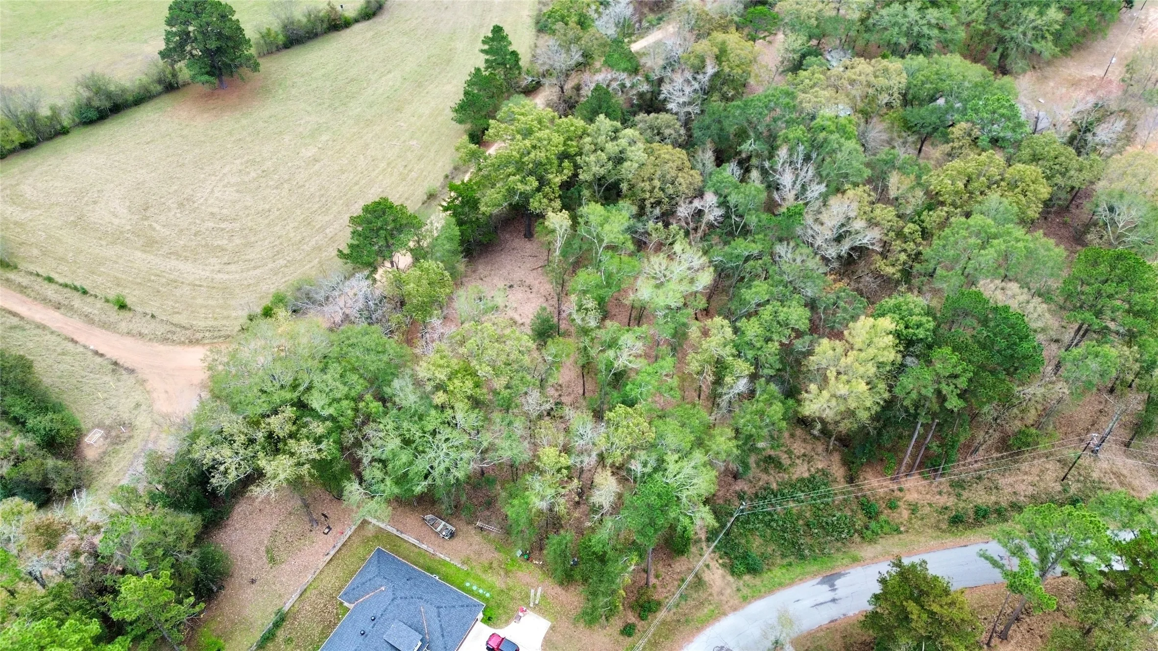 Aerial view of property's location featuring rural landscape