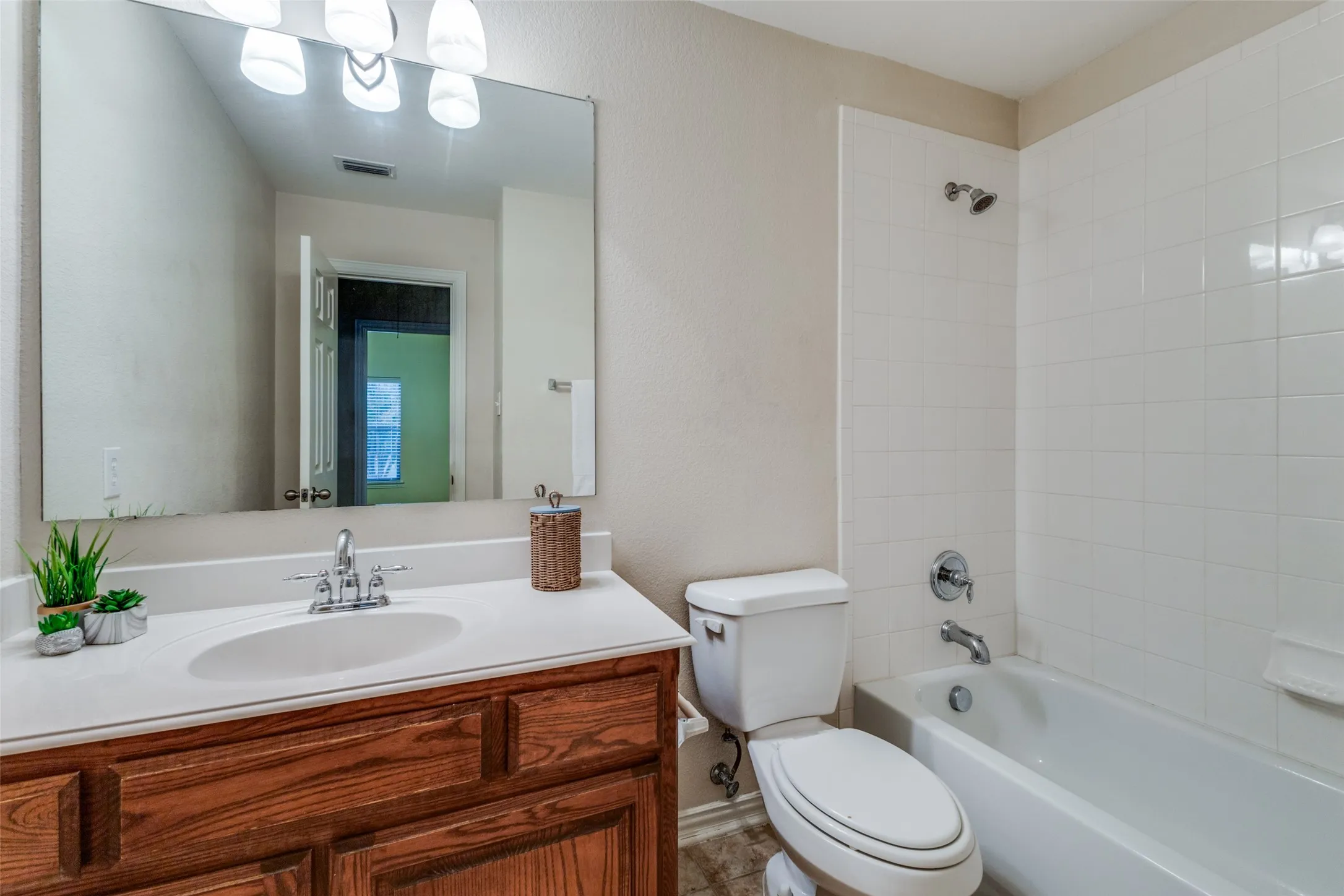 One of two upstairs full bathrooms.