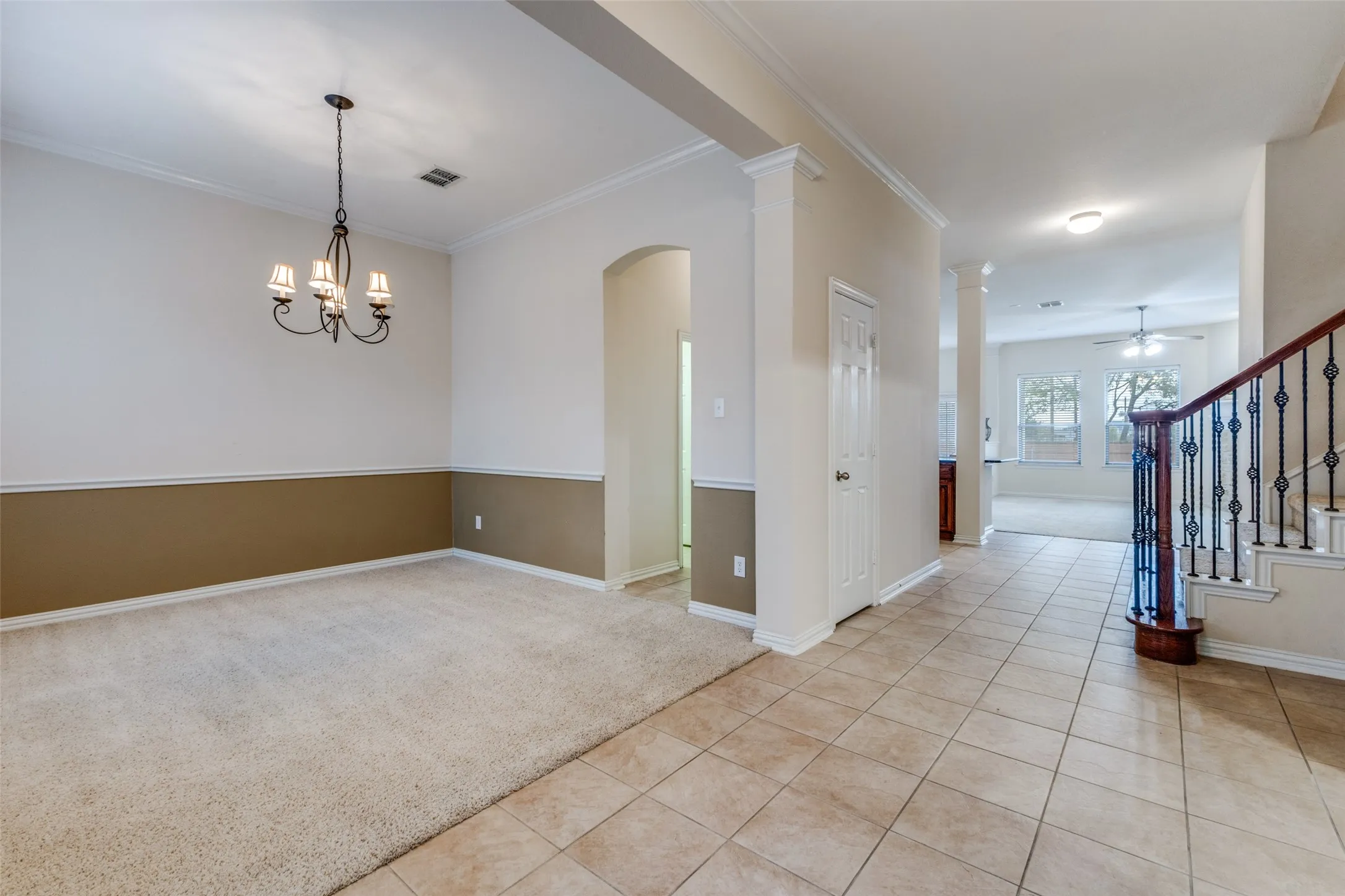 Enjoy a dining area  that is simply perfect for your gatherings! Elegant wrought iron railings on the staircase lead upstairs game to three guest rooms, 2 full baths and large open media-game room.
